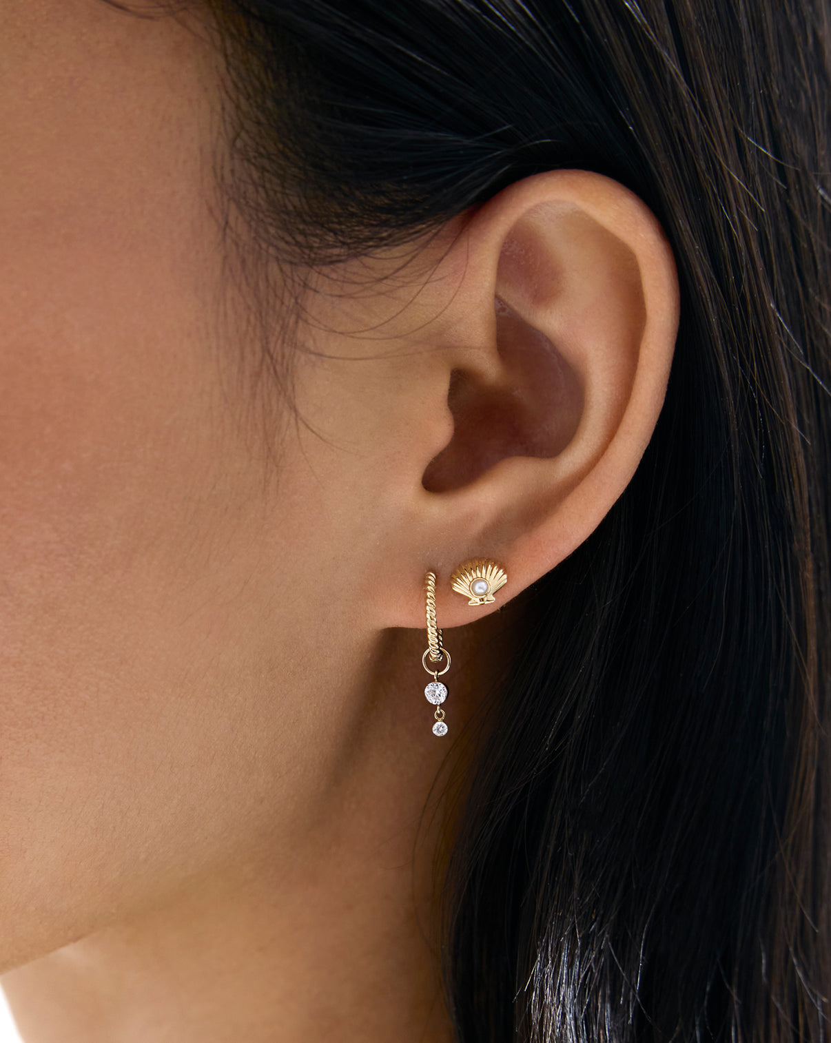 Seashell and Pearl Studs worn in ear in second hole