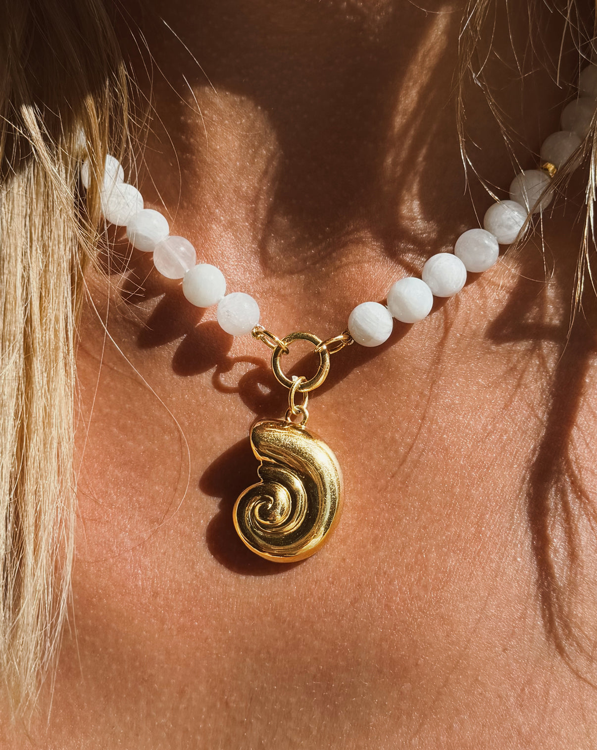 Tidal Treasure Pendant worn on our Salted Coconut Necklace