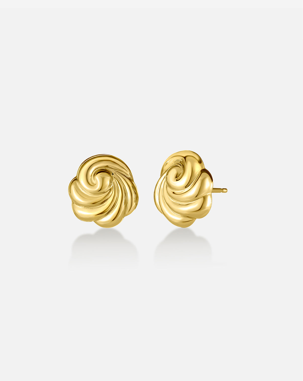 Swirling Studs featuring elegant curved gold design reminiscent of ocean waves