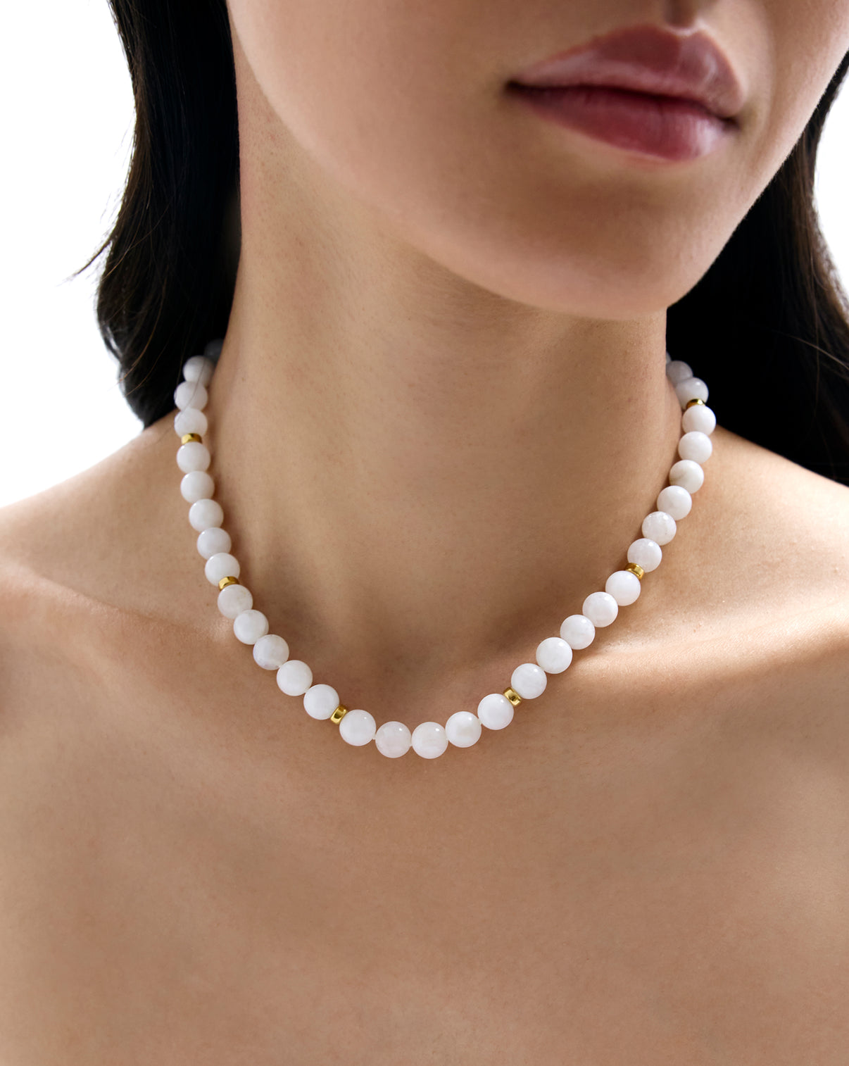 Close up of model wearing our Salted Coconut Necklace