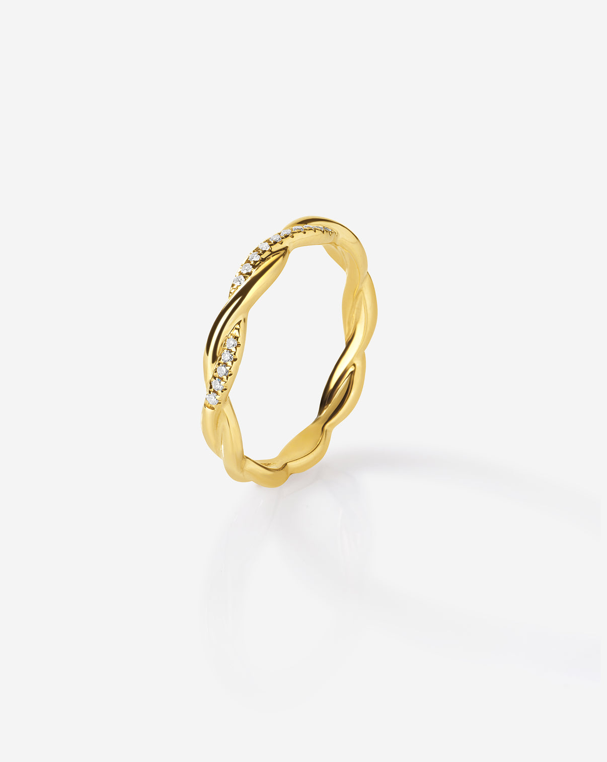 Side profile view of 14k gold twist ring displaying 2.4mm width and elegant twisted band design