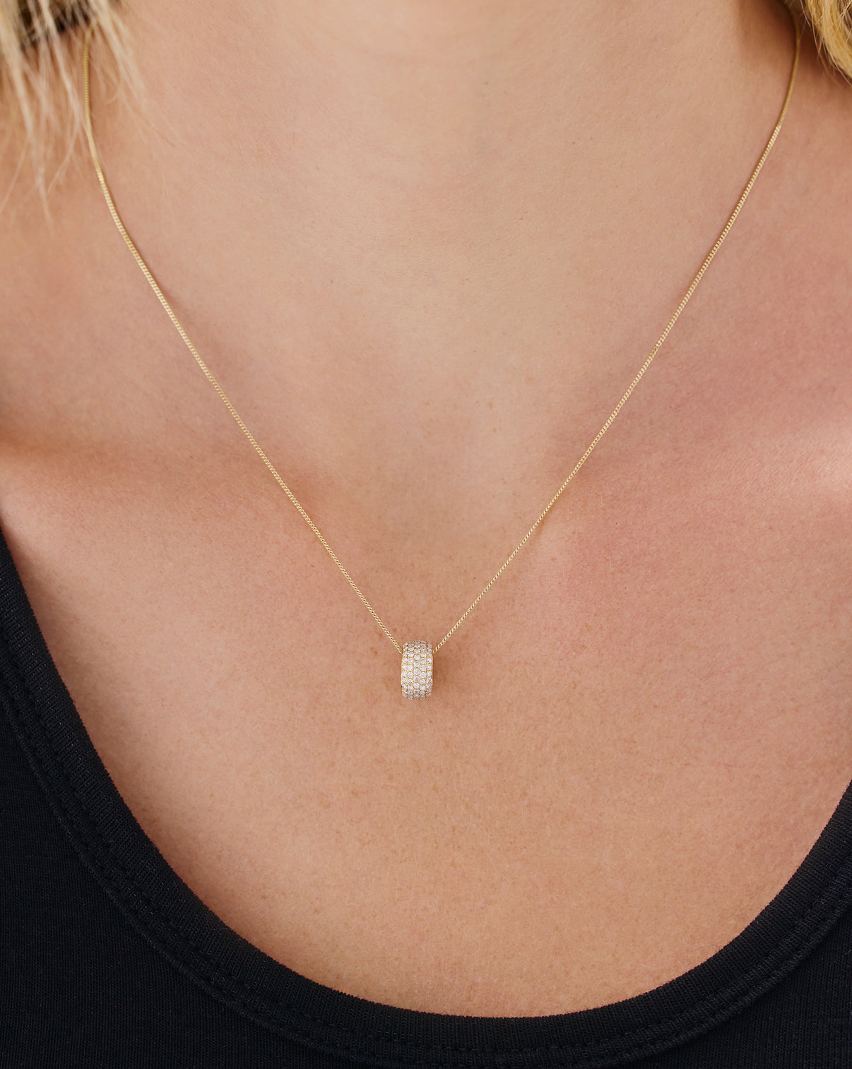 Alternative angle of large pavé bead charm showcasing the uniform diamond pavé setting across the surface