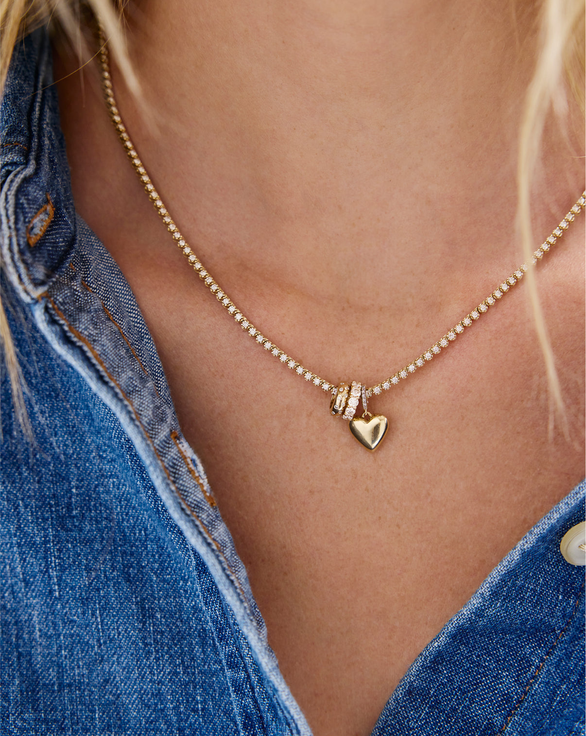 Round diamond bead charm showing gold setting and diamond texture detail