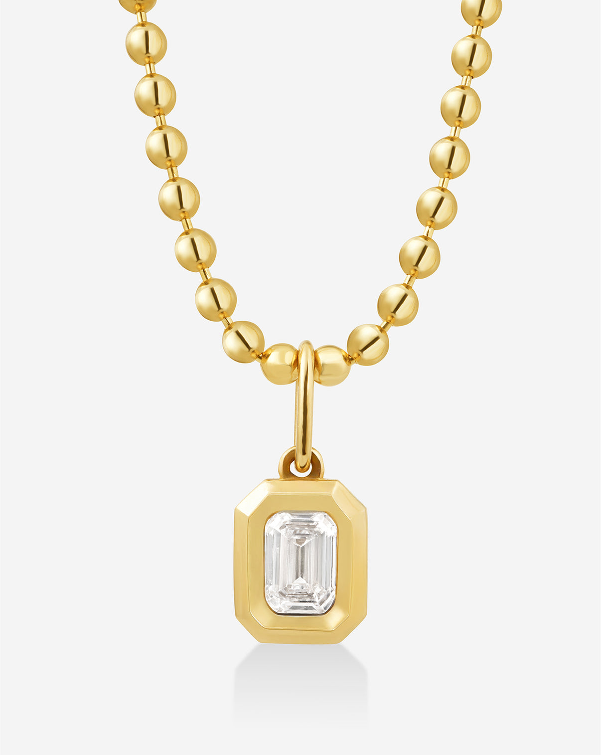 close up of pendant on bead chain necklace global