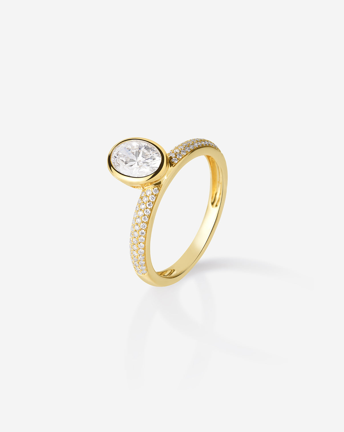 Detail shot of pavé diamonds halfway around the ring band