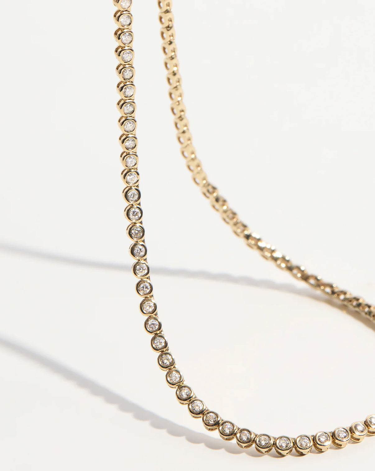 Detail shot of Bezel Mini Diamond Tennis Necklace clasp and closure mechanism for secure wearing global