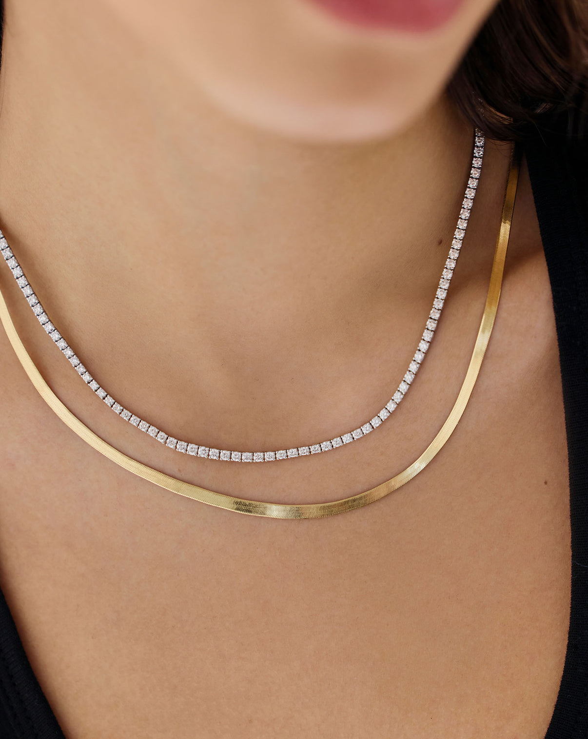 Model wearing Classic Diamond Tennis Necklace demonstrating how the piece complements any neckline GLOBAL