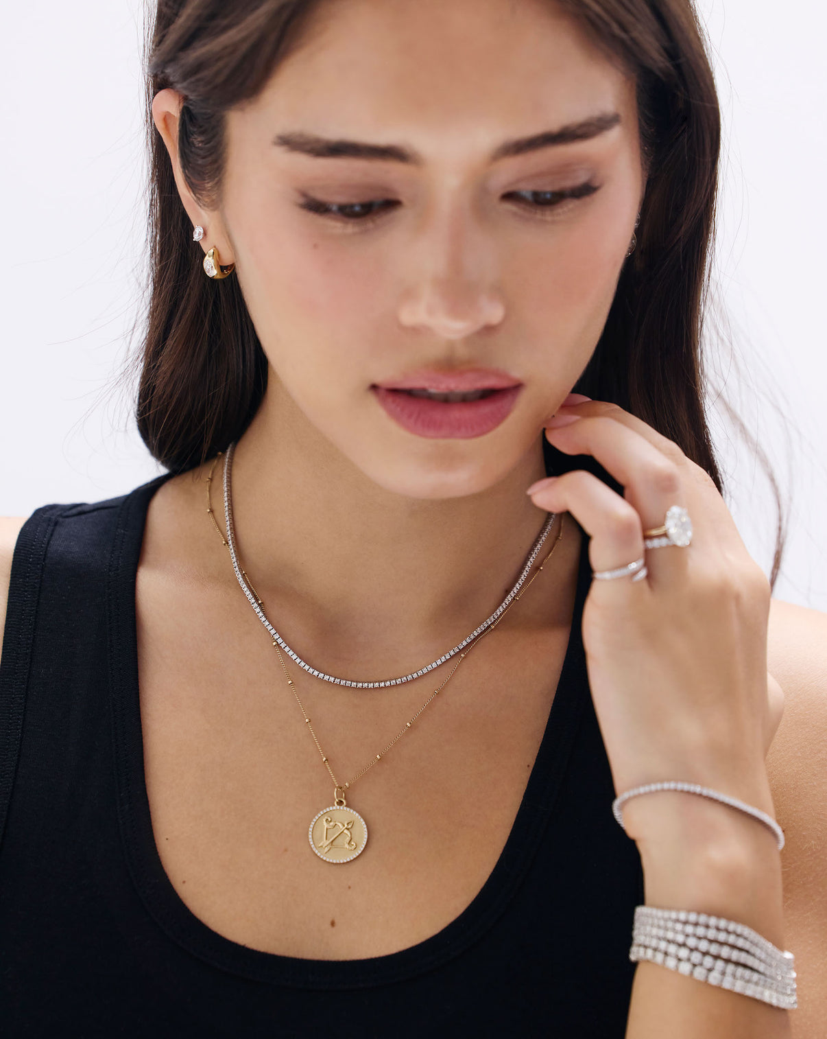 Classic Diamond Tennis Necklace on model featuring continuous prong-set round diamonds in white gold GLOBAL