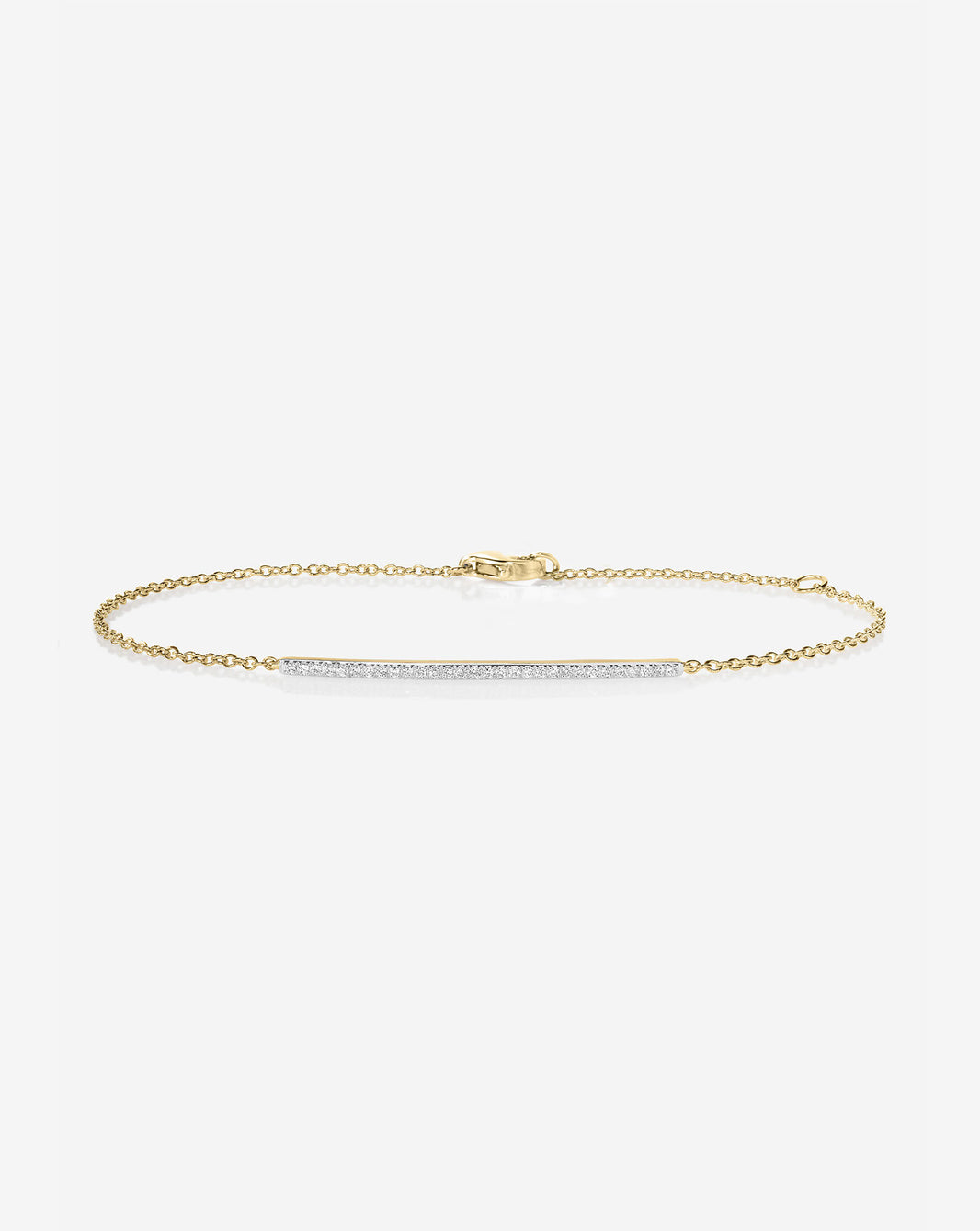 Flat lay image of Ring Concierge 14k Yellow Gold Diamond Bar Bracelet