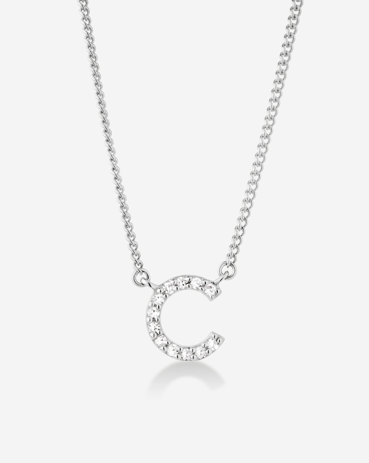 Diamond Initial Necklace detail shot showing premium 14k white gold chain and diamond setting - Ring Concierge