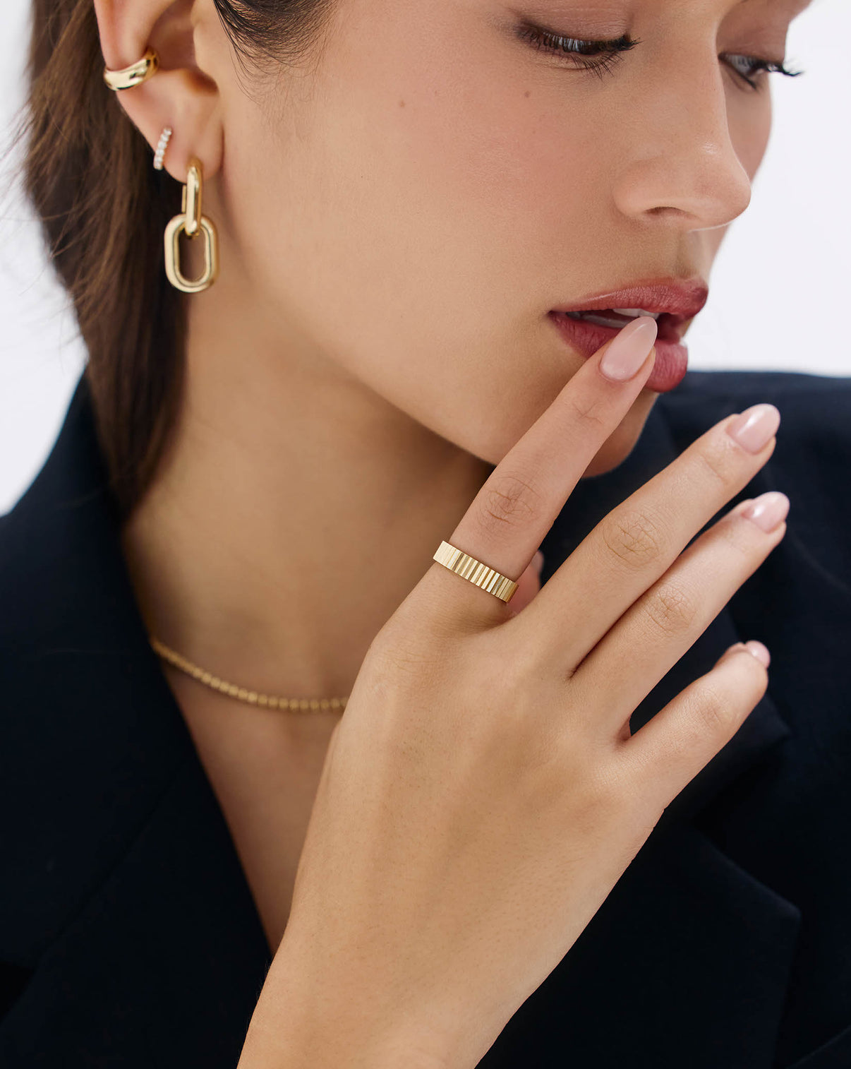 Model wearing Fluted Gold Stackable Ring in yellow gold GLOBAL