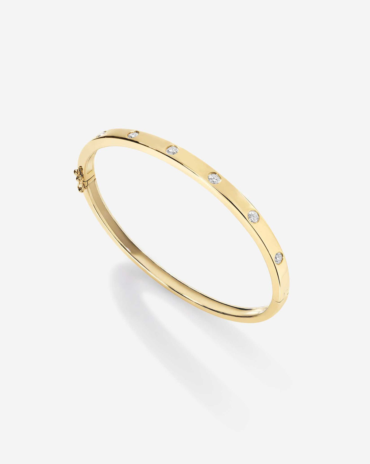Side profile view of yellow gold Inlay Diamond Bangle highlighting the smooth, comfortable band design with seamless diamond integration 14k yellow gold