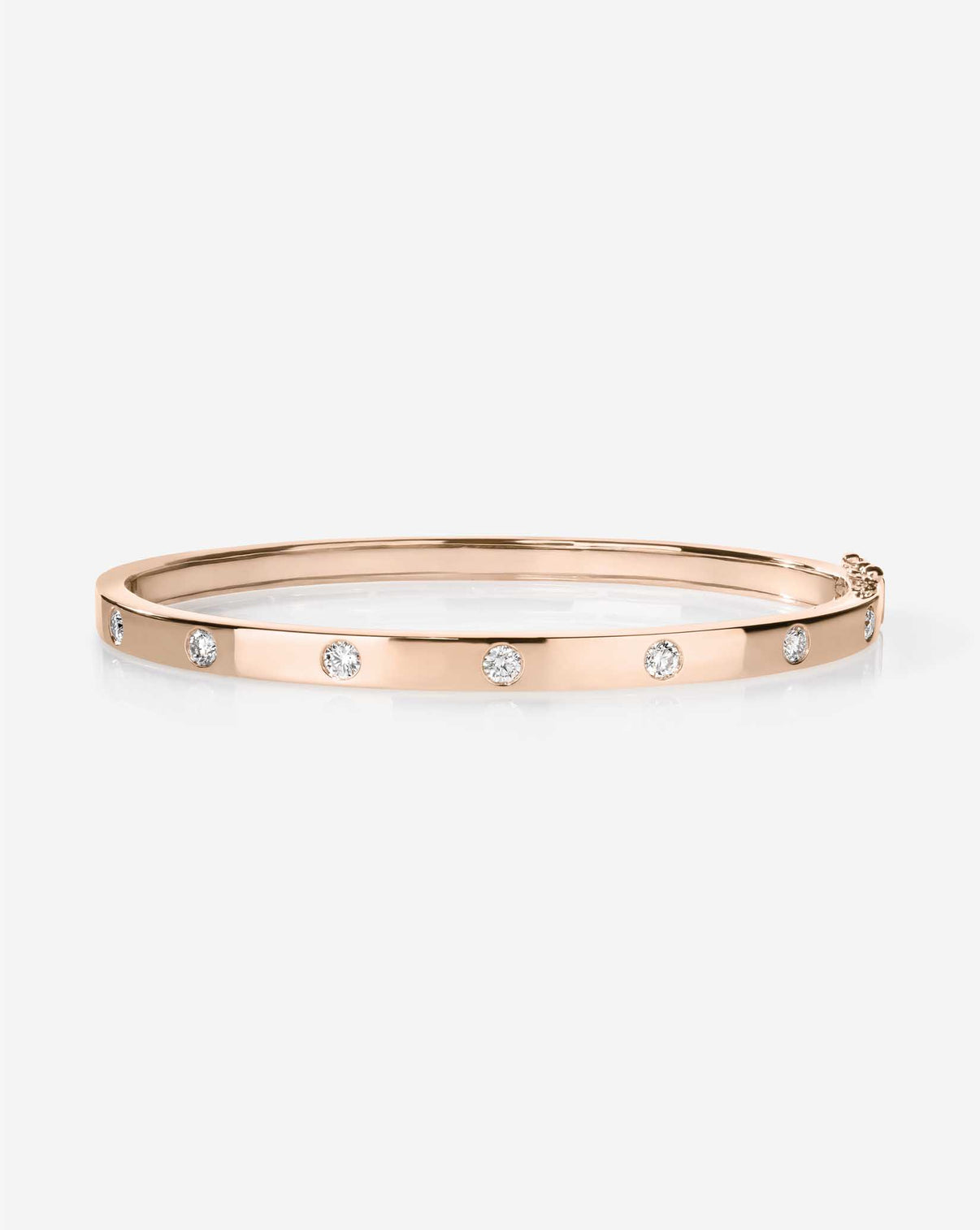 Overhead view of rose gold Inlay Diamond Bangle displaying the circular pattern of inlaid diamonds and overall symmetry 14k rose gold