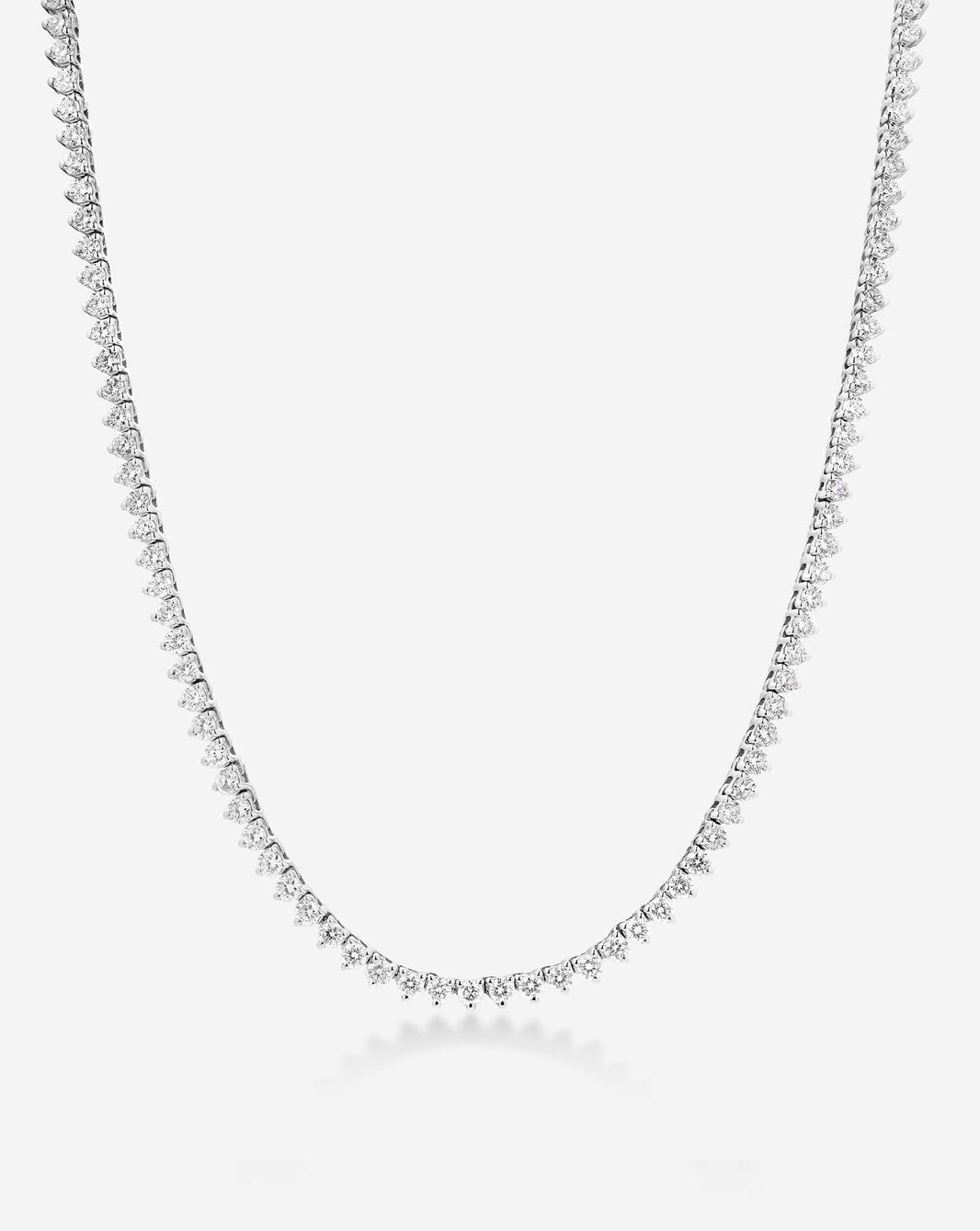 Martini Diamond Tennis Necklace, angled view showcasing three-prong diamond settings on a white background  14k white gold
