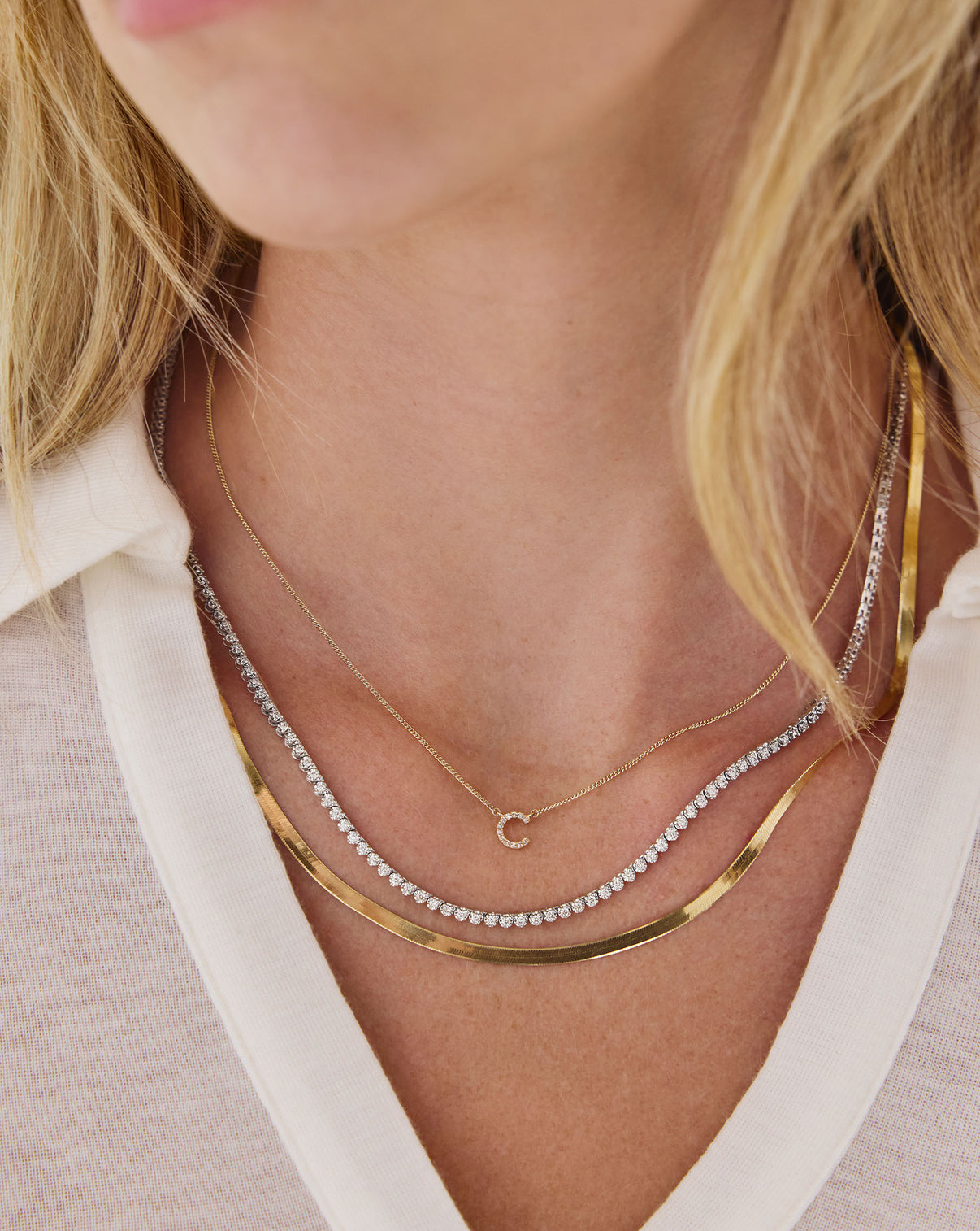Mini Diamond Tennis Necklace arranged in curved position displaying the flexible chain and diamond continuity GLOBAL