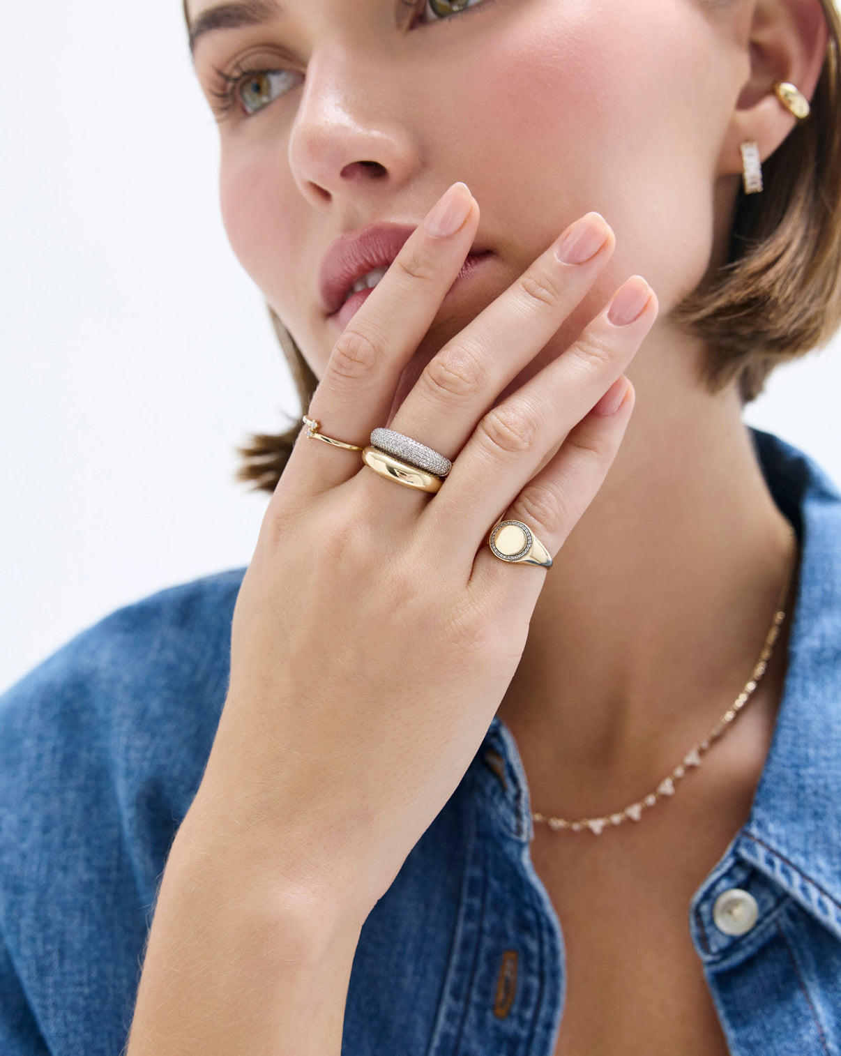Ring Concierge model displaying the Pavé Diamond Cloud Ring with brilliant diamond pavé detailing in 14k solid gold