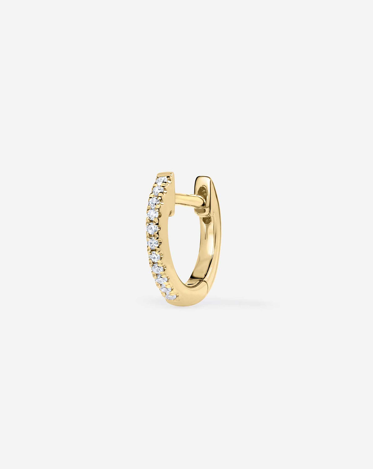 Close up of the Petite Diamond Huggies Earrings 14K Yellow Gold 