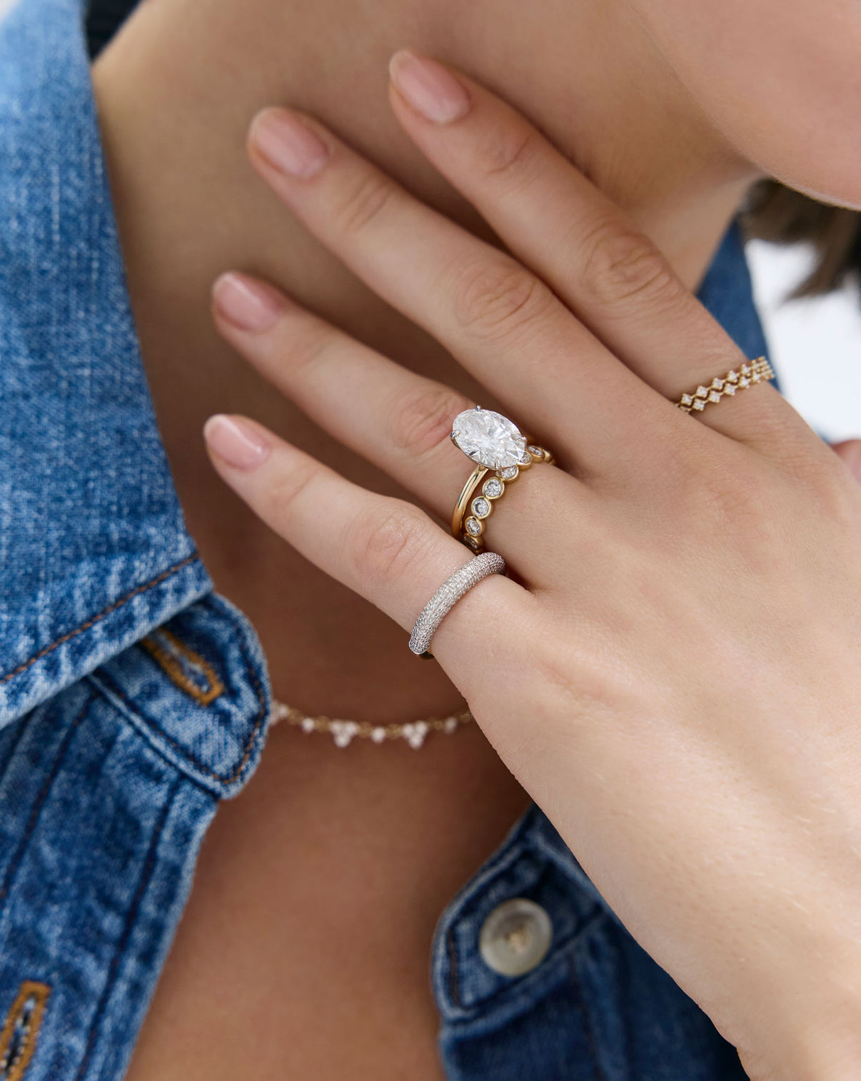 Petite Pavé Diamond Cloud Ring on hand showcasing delicate pavé diamond cluster