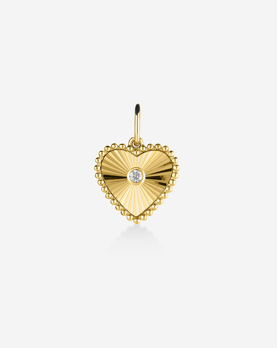 Fluted Heart Pendant in 14k gold with diamond center, shown on white background