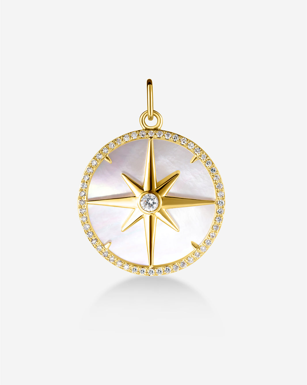 Fluted Pearl Star Pendant in 14k gold featuring a lustrous pearl center surrounded by radiating star design