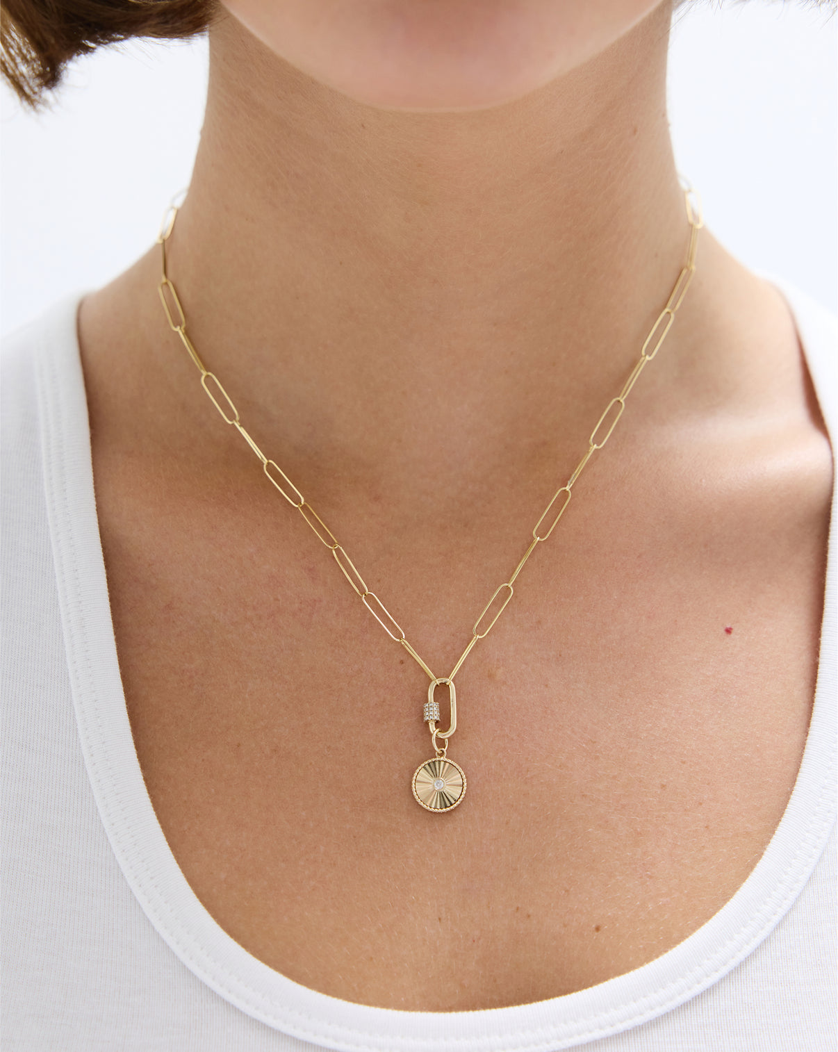 Gold carabiner pendant side view with functional spring gate