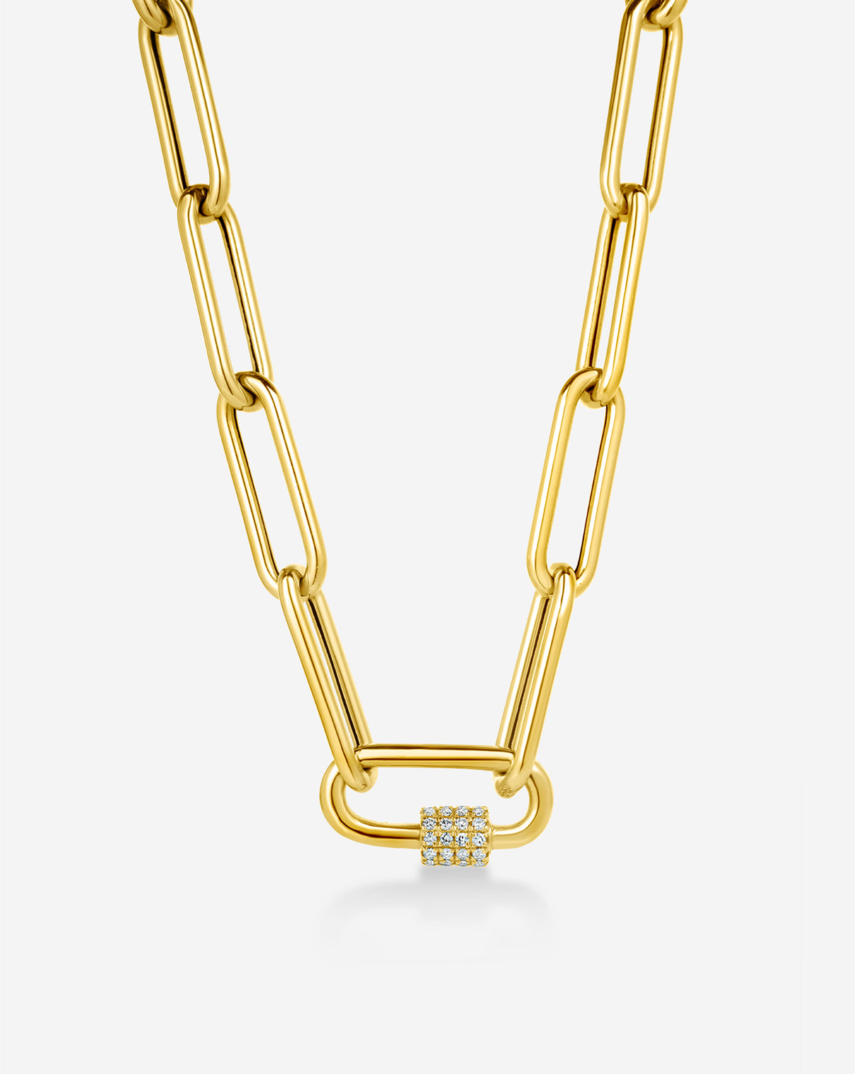 Macro detail of gold split chain necklace surface and craftsmanship gold carabiner