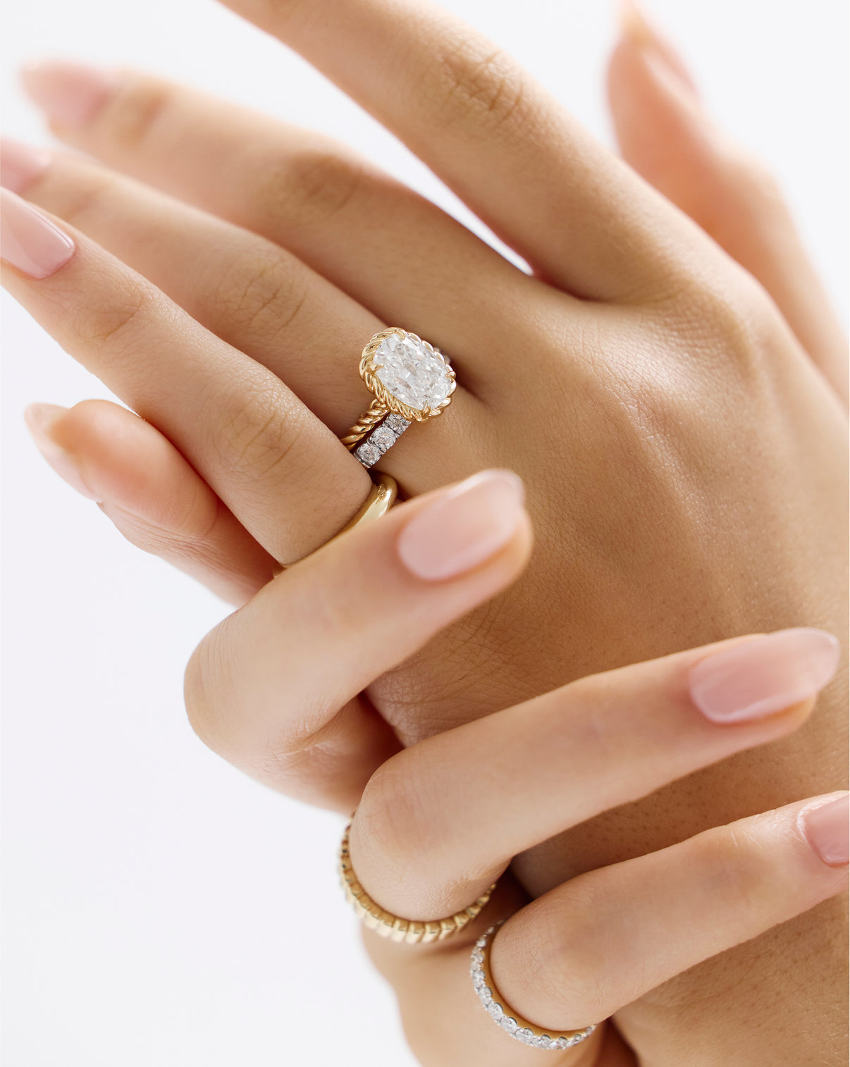 On figure 3.01 Cushion Lab Diamond in Twisted Wrap with eternity band

43126334488664