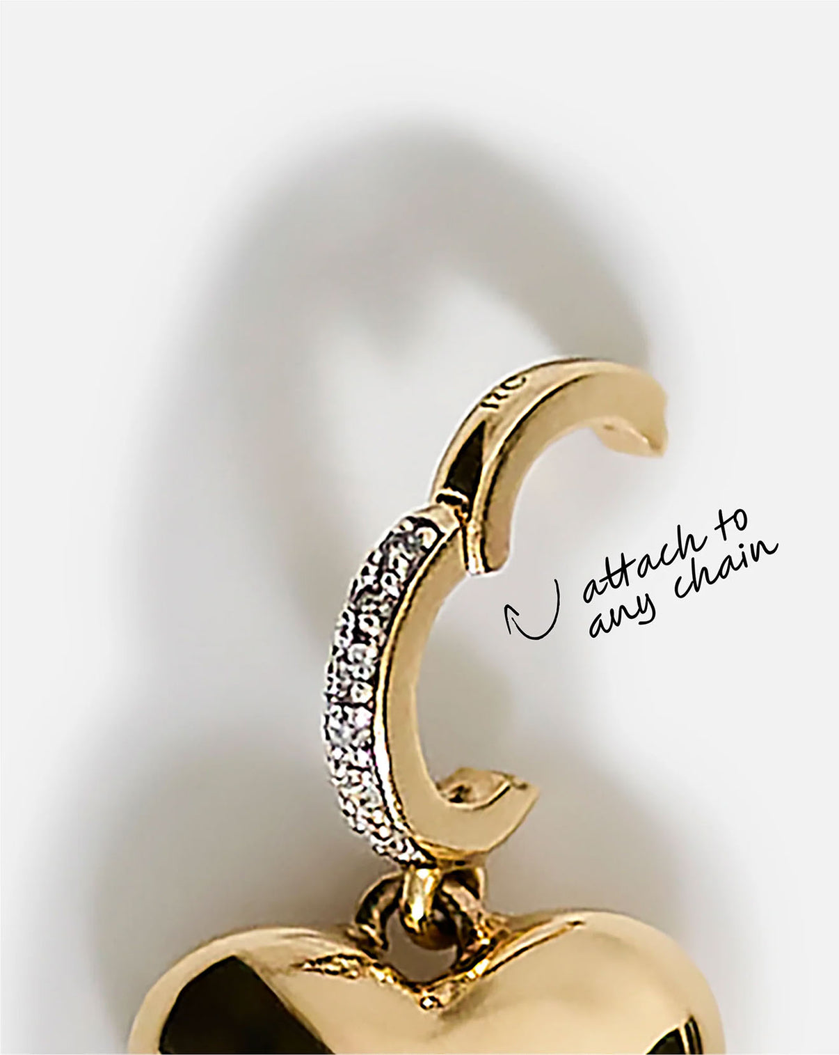 close up detail of charm clasp to detach and add to any chain