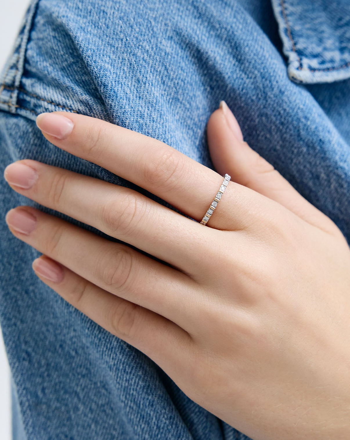 Fluted Diamond Ring styled solo on model's ring finger global