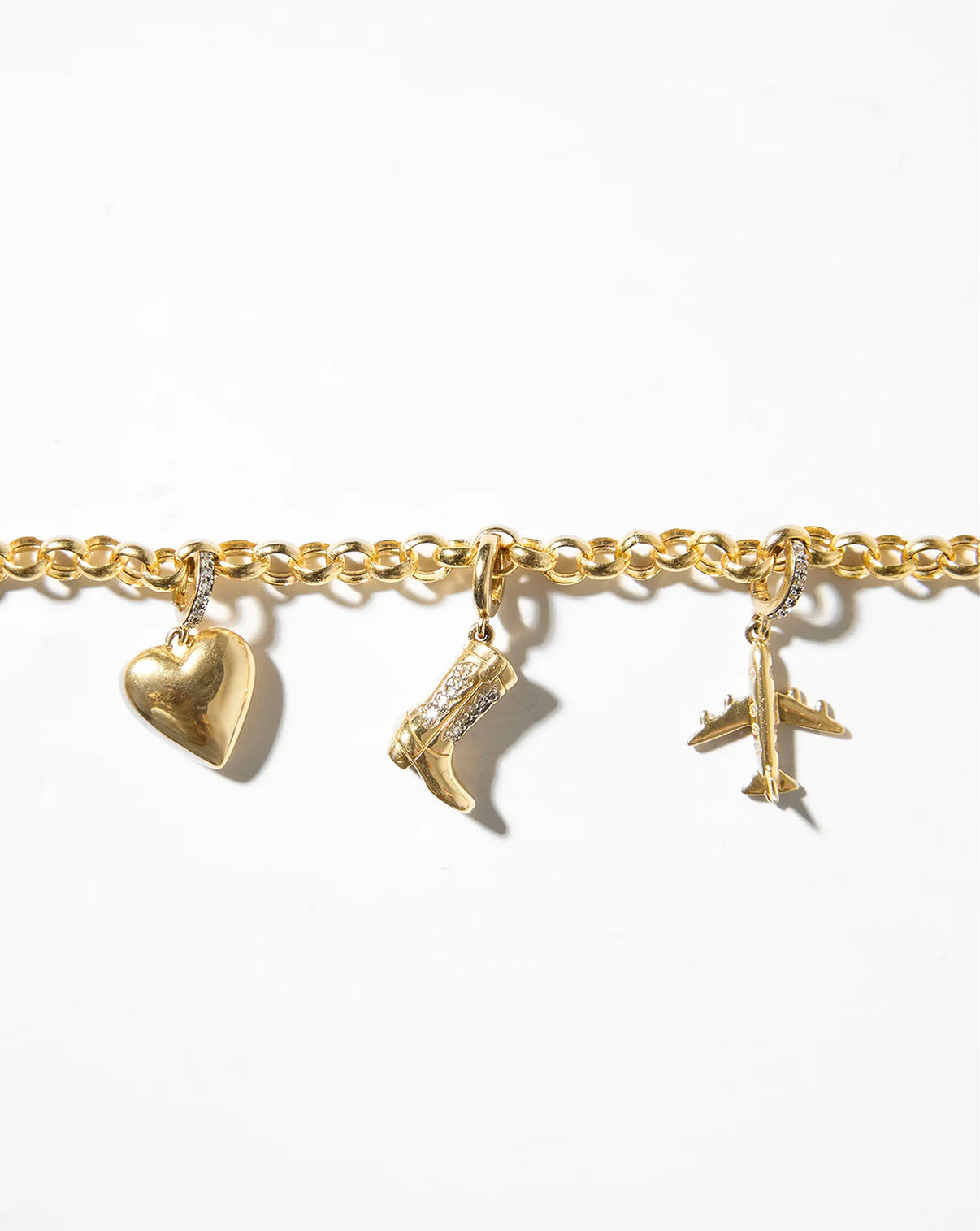 Flat lay image of chain bracelet with charms