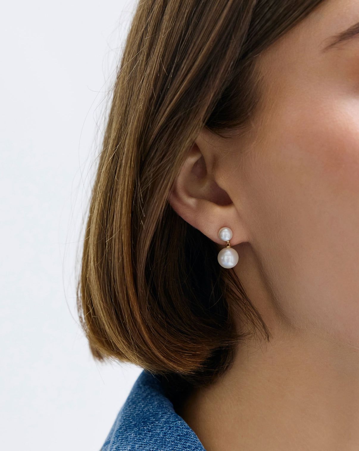 Pearl Duo Dangle Earrings styled on model