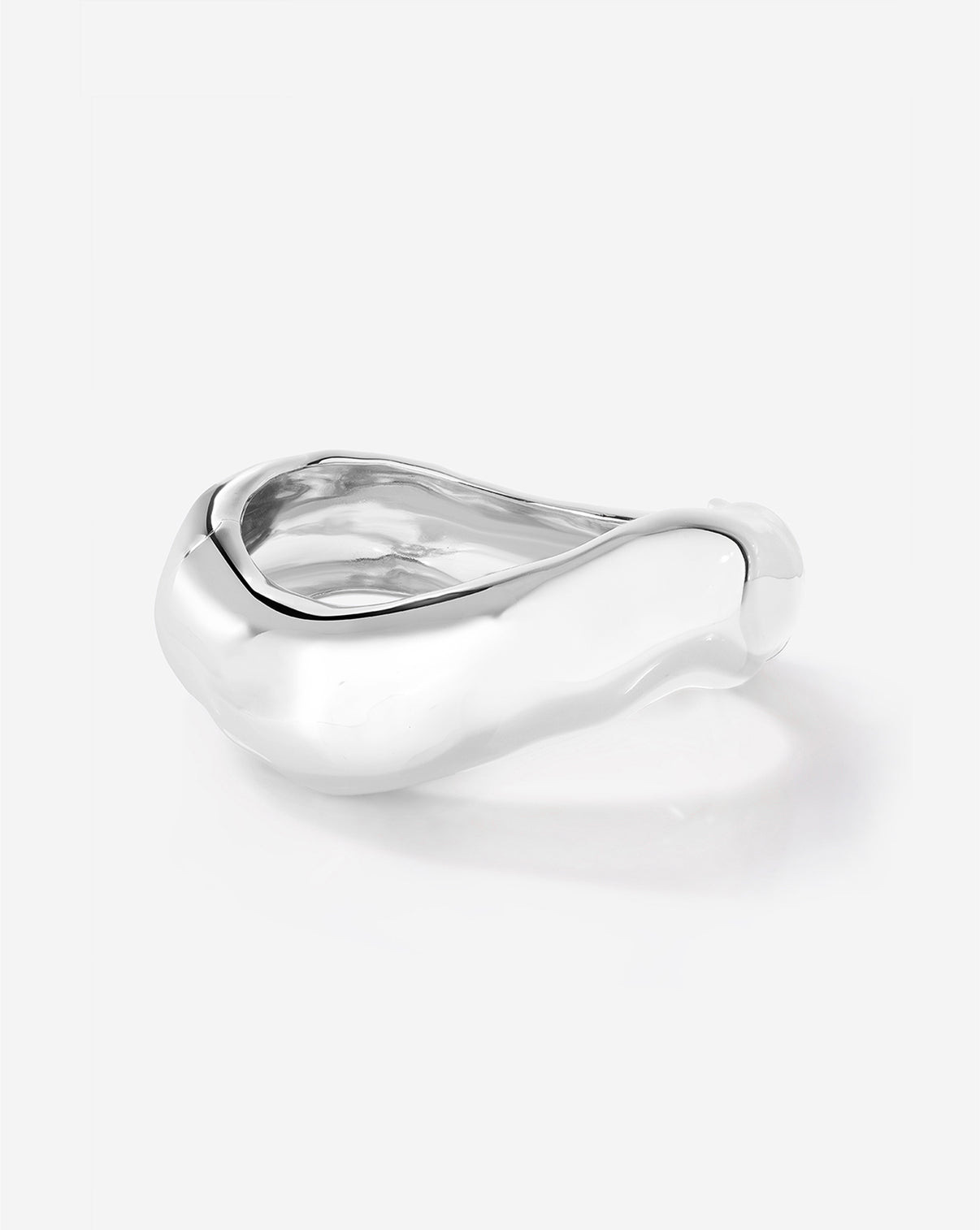 Ring Concierge Melted Bangle in sterling silver shot in a white background emphasizing the contemporary, artistic jewelry design