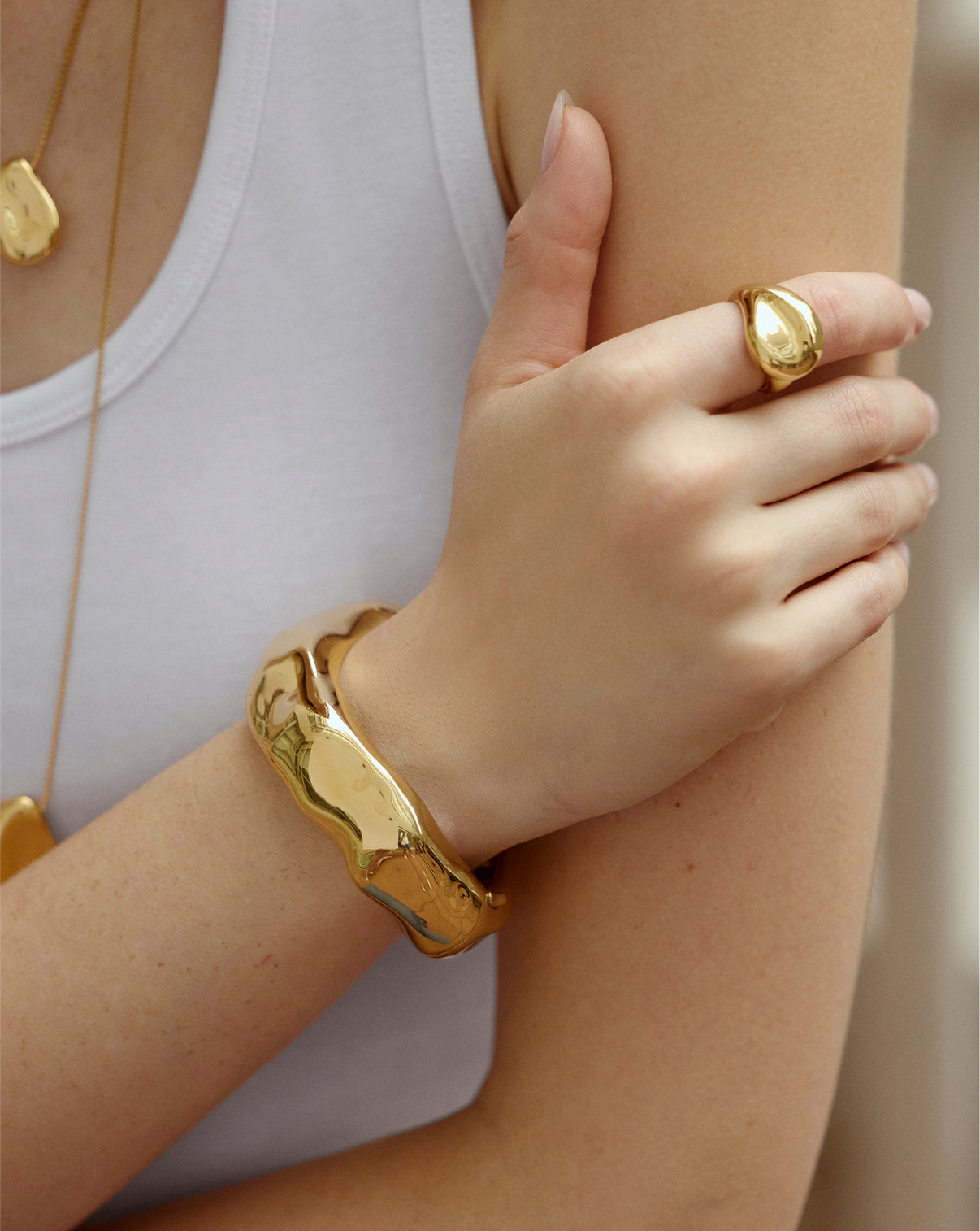 Ring Concierge Melted Pebble Ring worn on hand, showing scale and how the organic design complements the finger