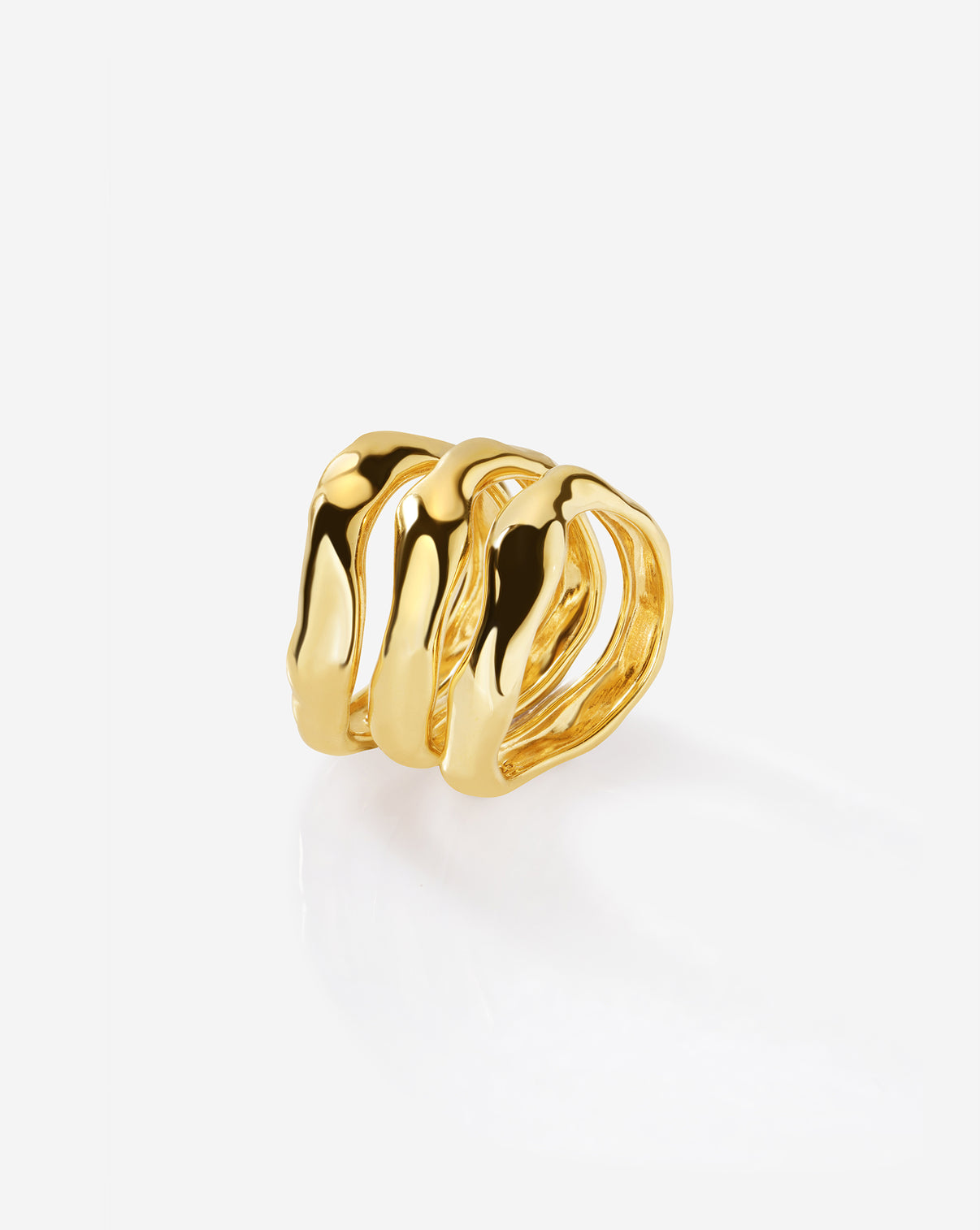 Close-up view of Ring Concierge Melted Stackable Ring Set showing textured, molten-inspired gold band details