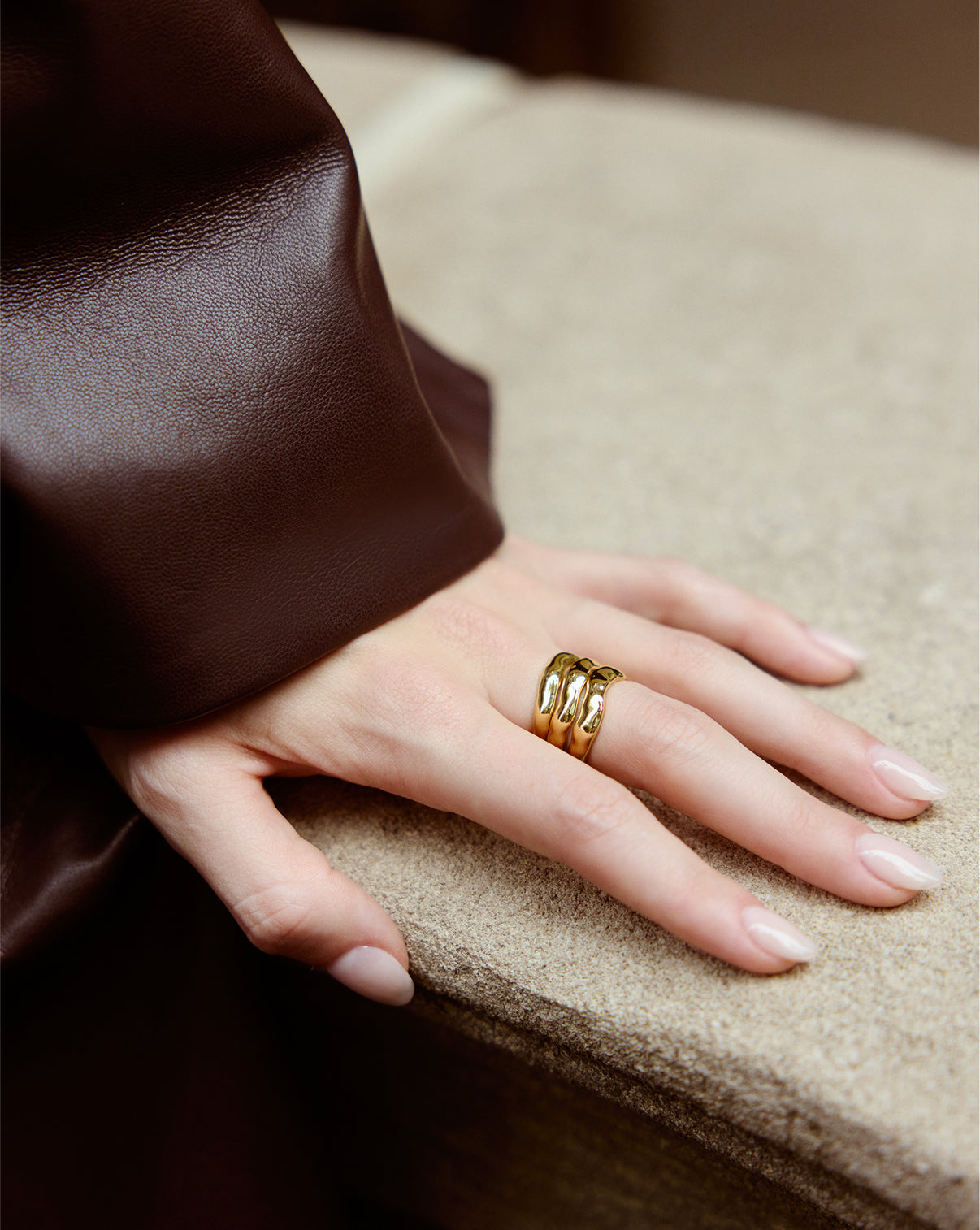 Ring Concierge Melted Stackable Ring Set worn on hand, showcasing how the three rings stack together beautifully