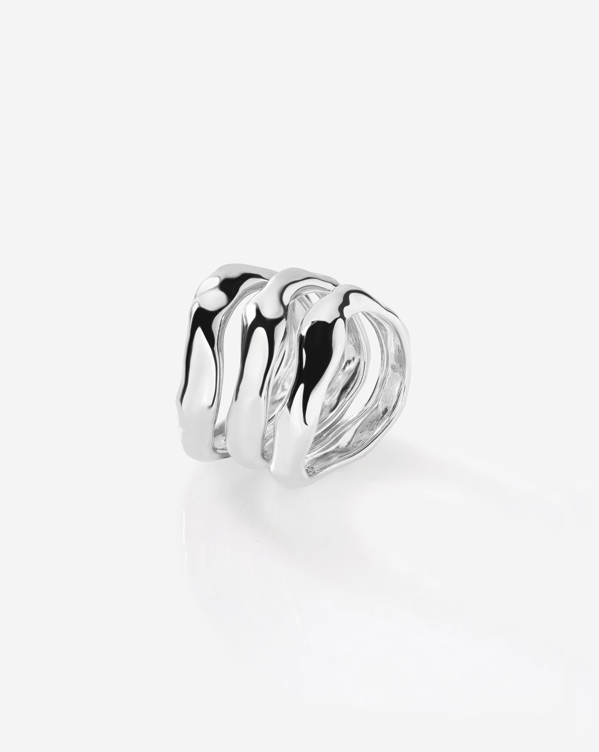 Detailed product shot of Ring Concierge Melted Stackable Ring Set highlighting the artisanal craftsmanship and sterling silver finish