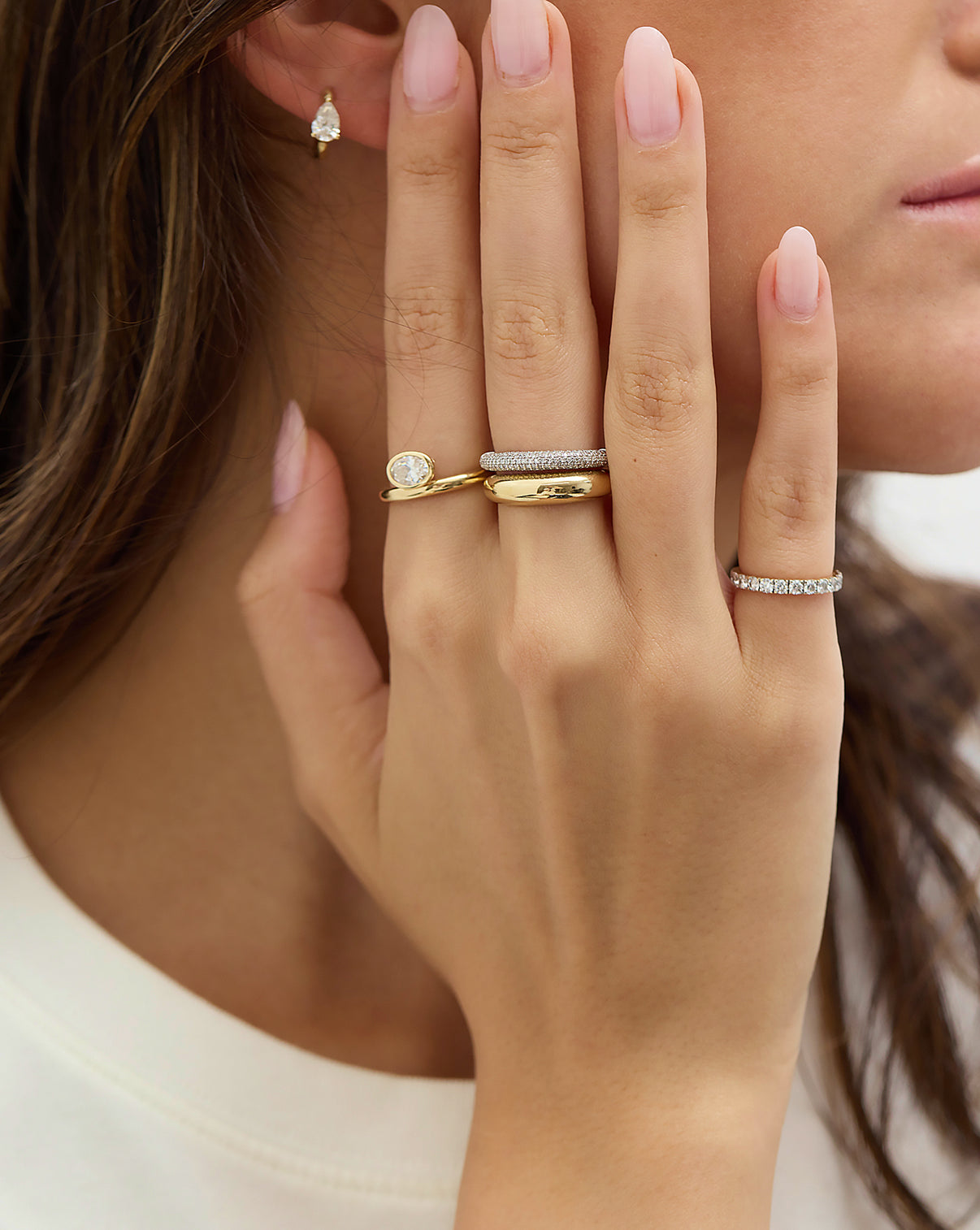 Cloud Ring  shown on model with pave gold cloud ring and other diamond and gold rings