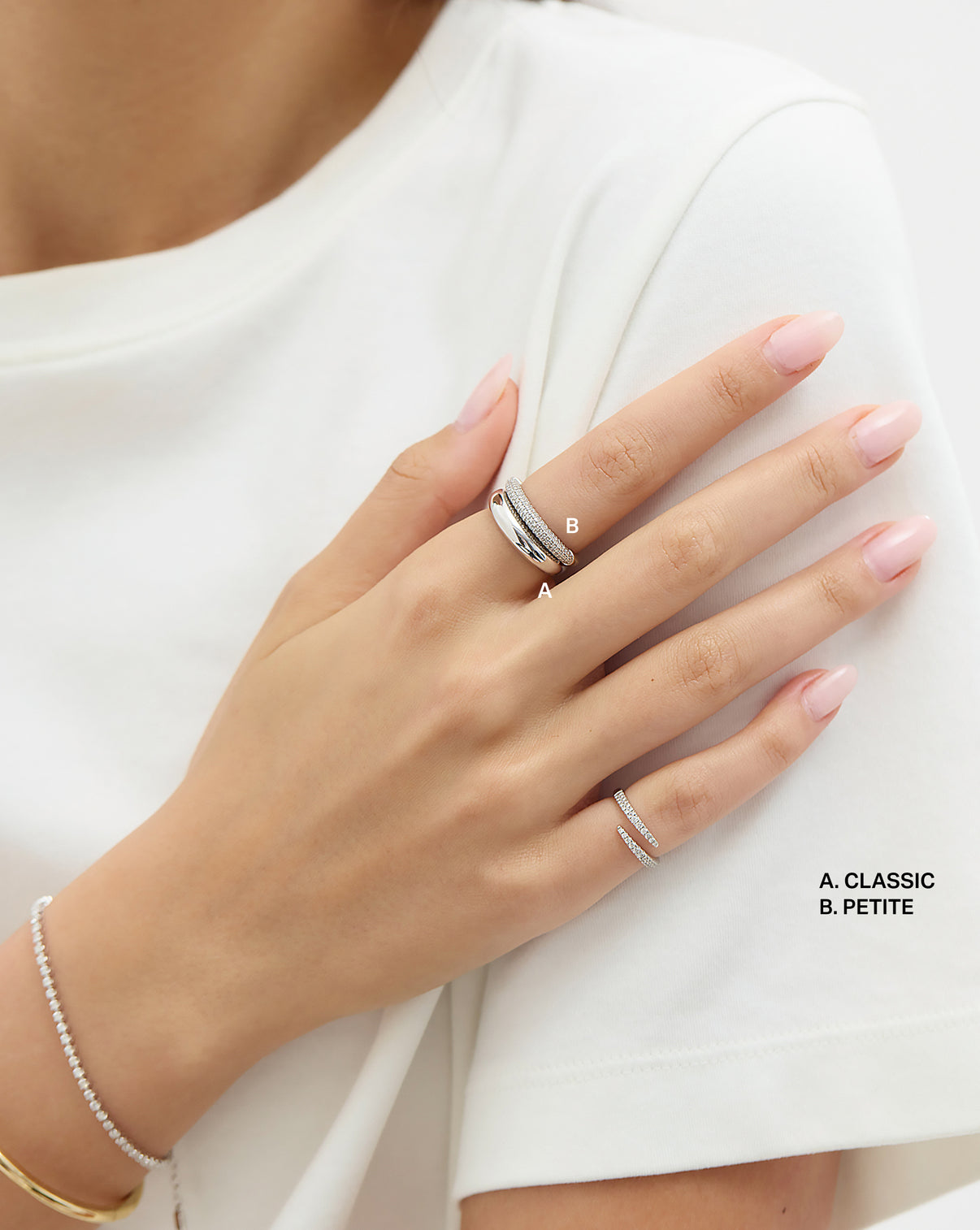 Sterling Silver Cloud Ring stacked with pave cloud ring on model comparing classic and petite width options 14k white gold