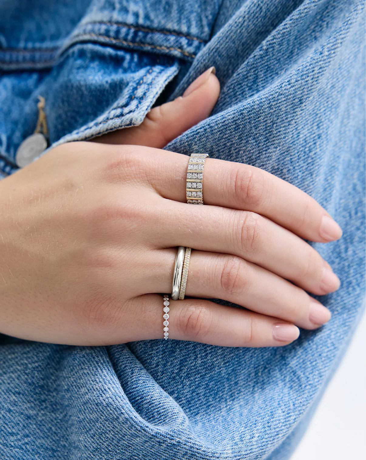 Petite cloud ring in sterling silver worn by model, lifestyle shot 14k white gold