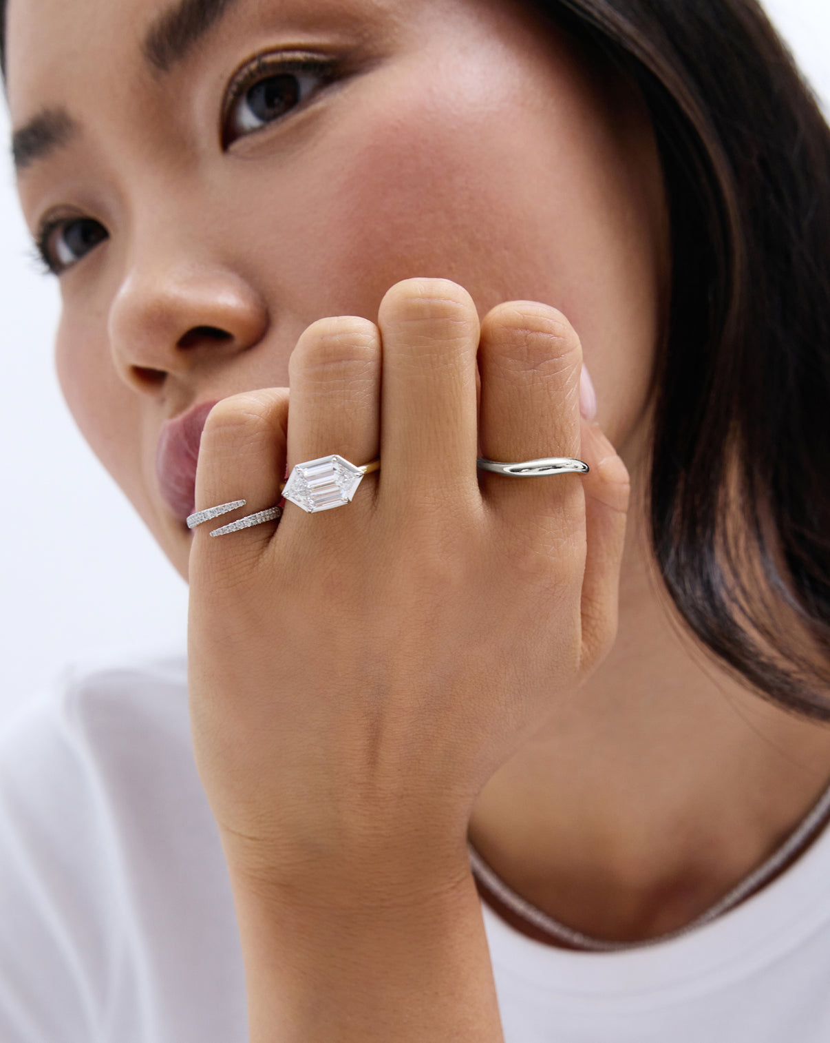 Petite Movement Cloud Ring shown with an engagement ring and open diamond wrap ring
sterling silver