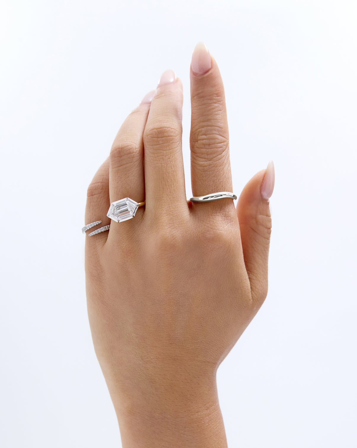 model wearing Petite Movement Cloud Ring and engagement ring
14k white gold