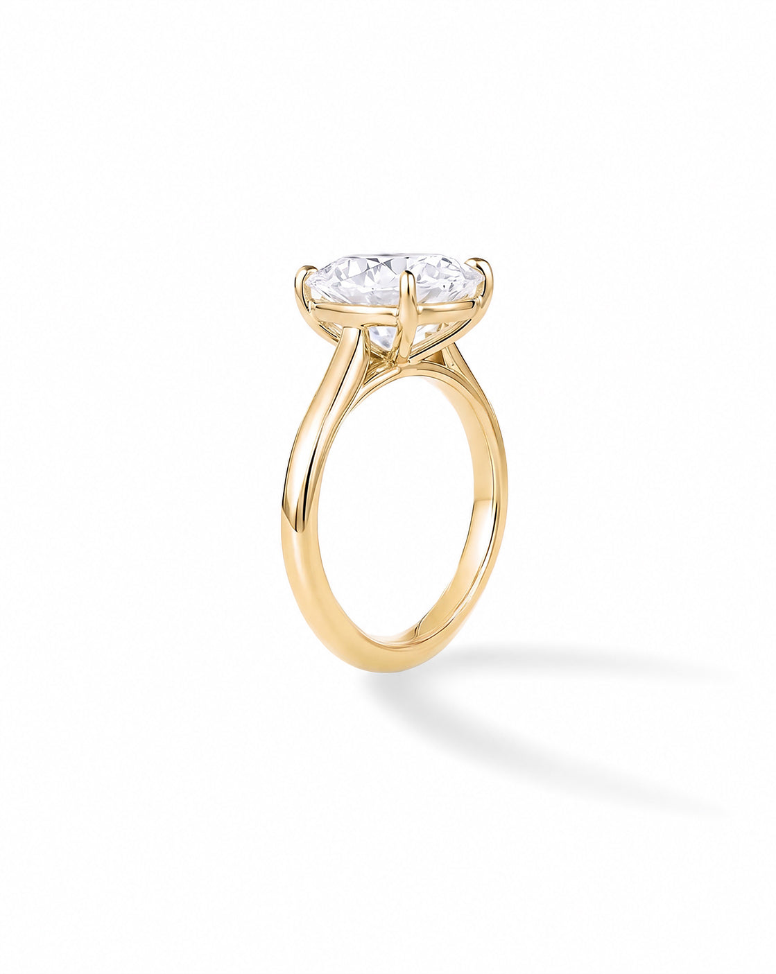 Front view of the 14k Yellow Gold cathedral engagement ring with cushion-cut diamond, on white background 50527022514264
