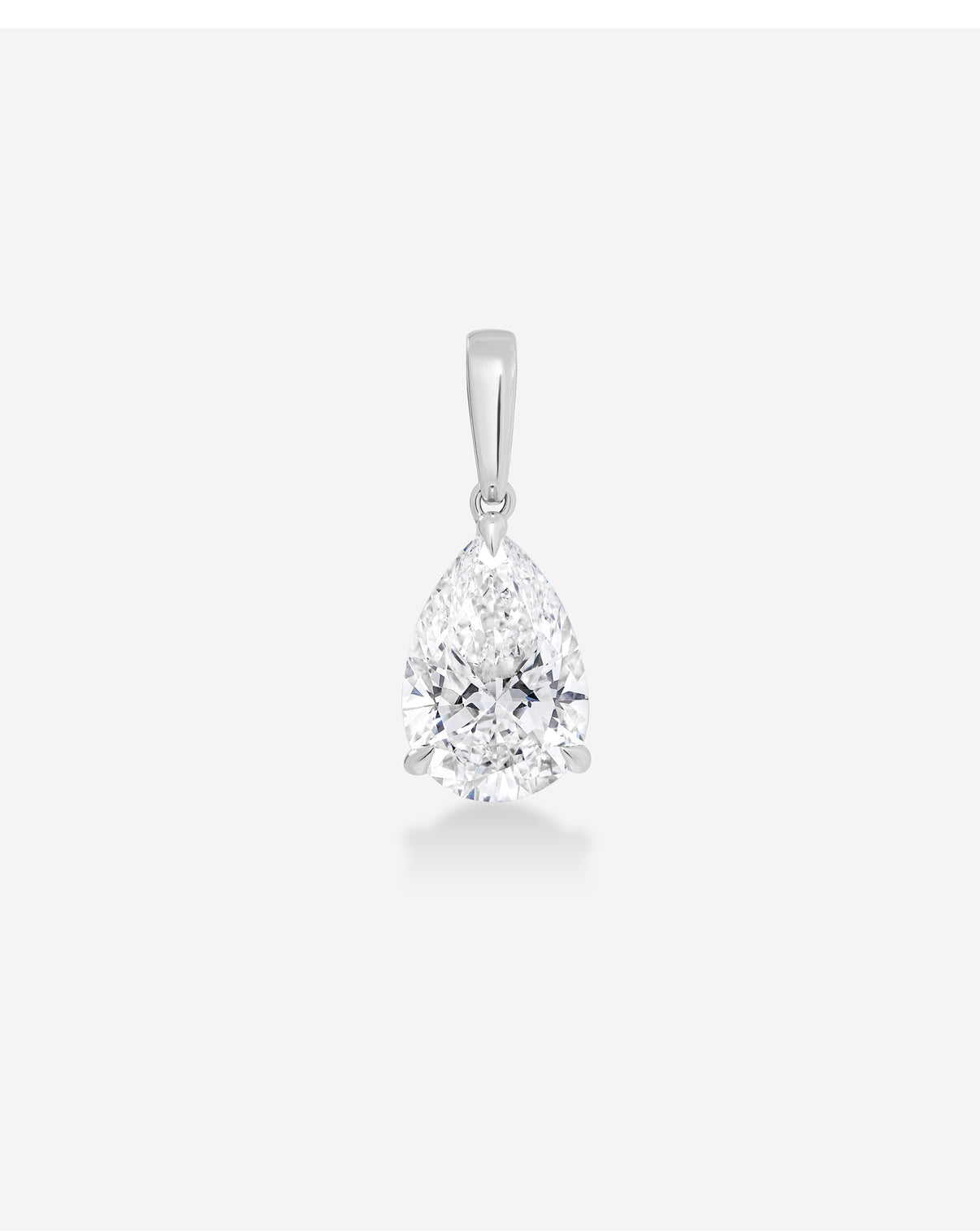 A pear-cut diamond pendant in a silver four-prong setting, suspended from a polished bail, centered on a light gray background.