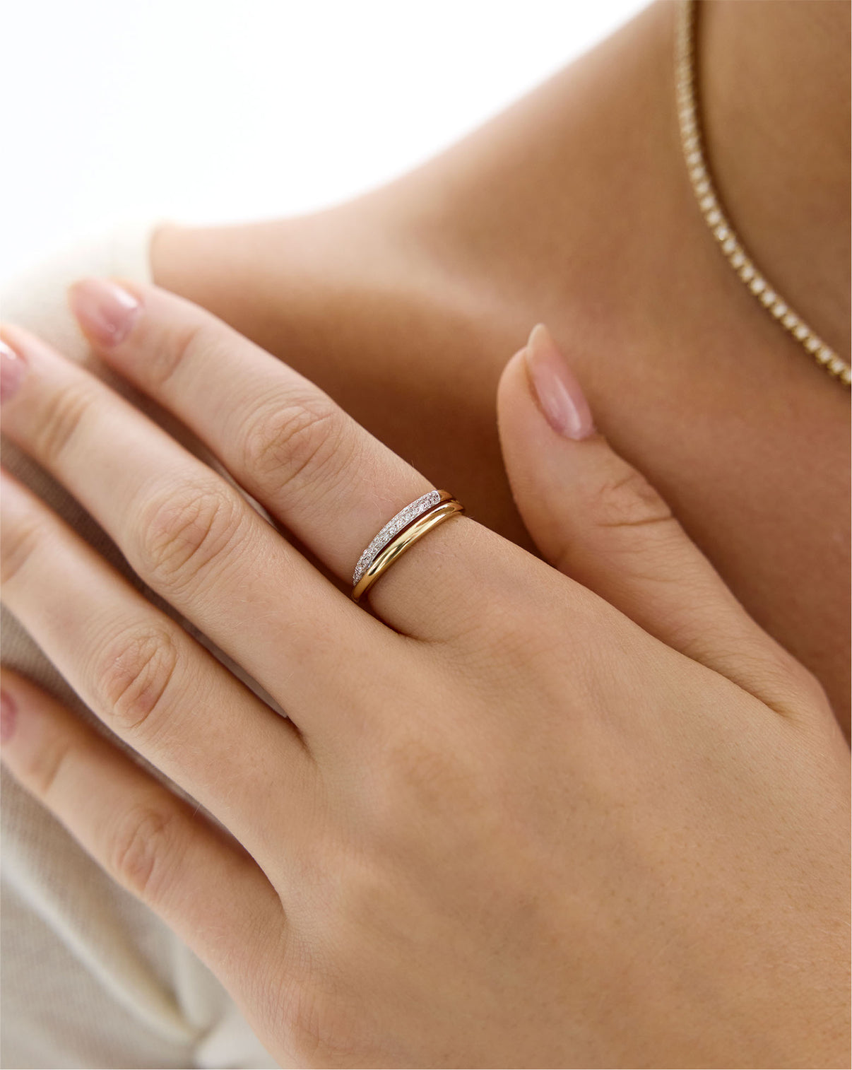 Close up of Double Row Ring worn on finger showing ring details GLOBAL