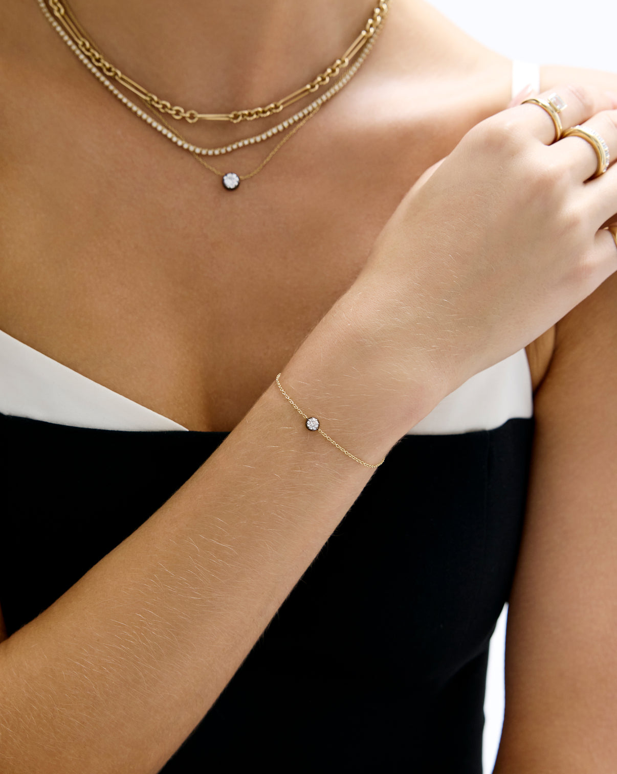Georgian bracelet with lab diamonds and 14k gold being worn on arm