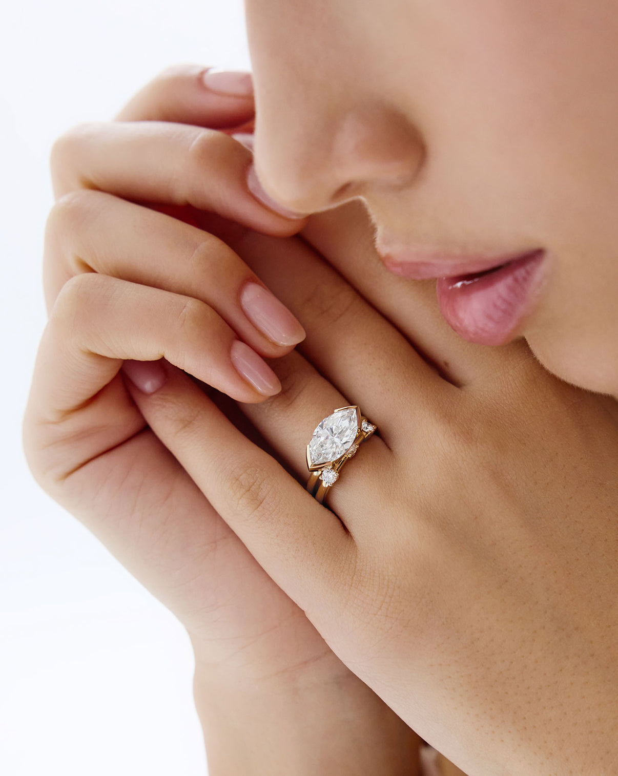 close up view of diamond trio wedding band with edge marquise engagement ring GLOBAL