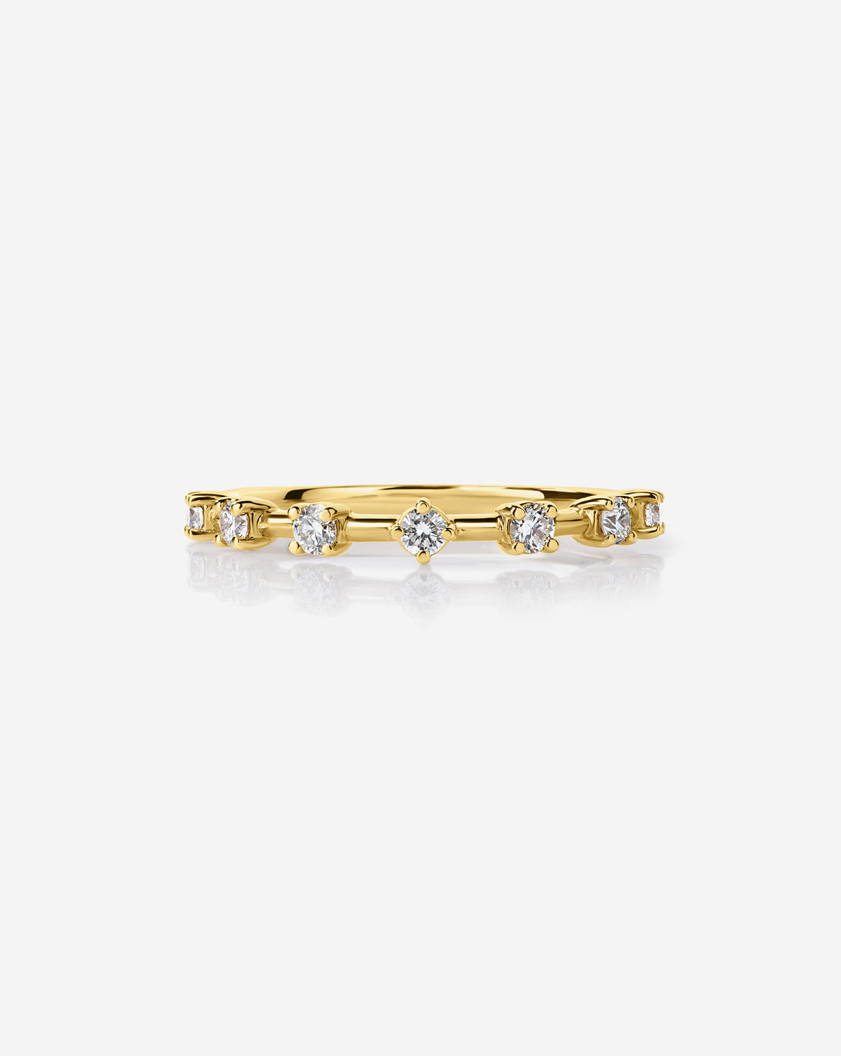 14k Yellow Gold Diamond Station Wedding Band with 7 round natural diamonds.