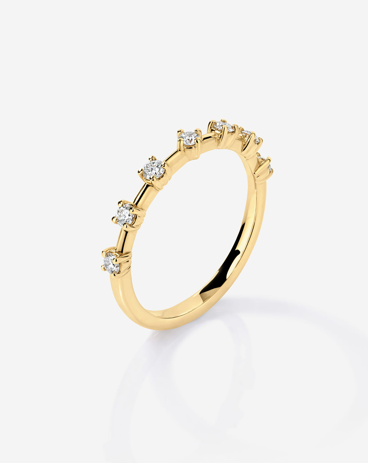 Side angle view of 14k Yellow Gold Lab Diamond Station Wedding Band