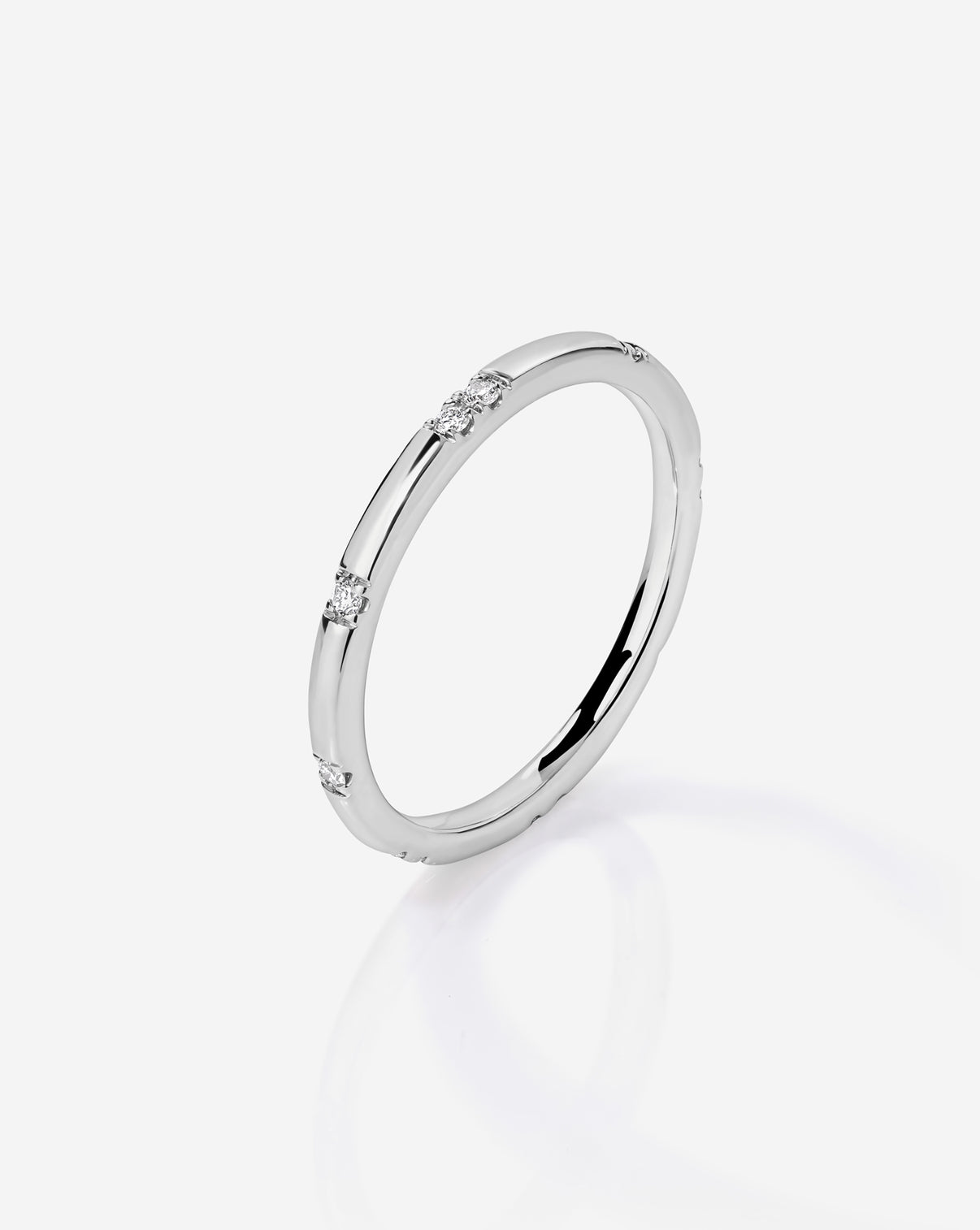 Side angle view of Platinum Scattered Diamond Wedding Band