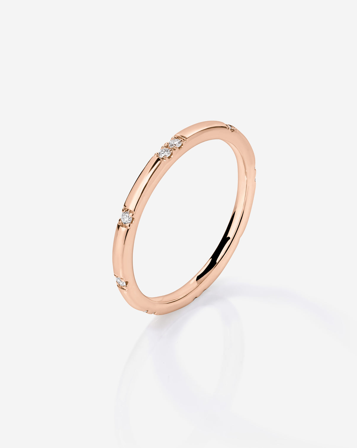 Side angle view of 14k Rose Gold Scattered Diamond Wedding Band